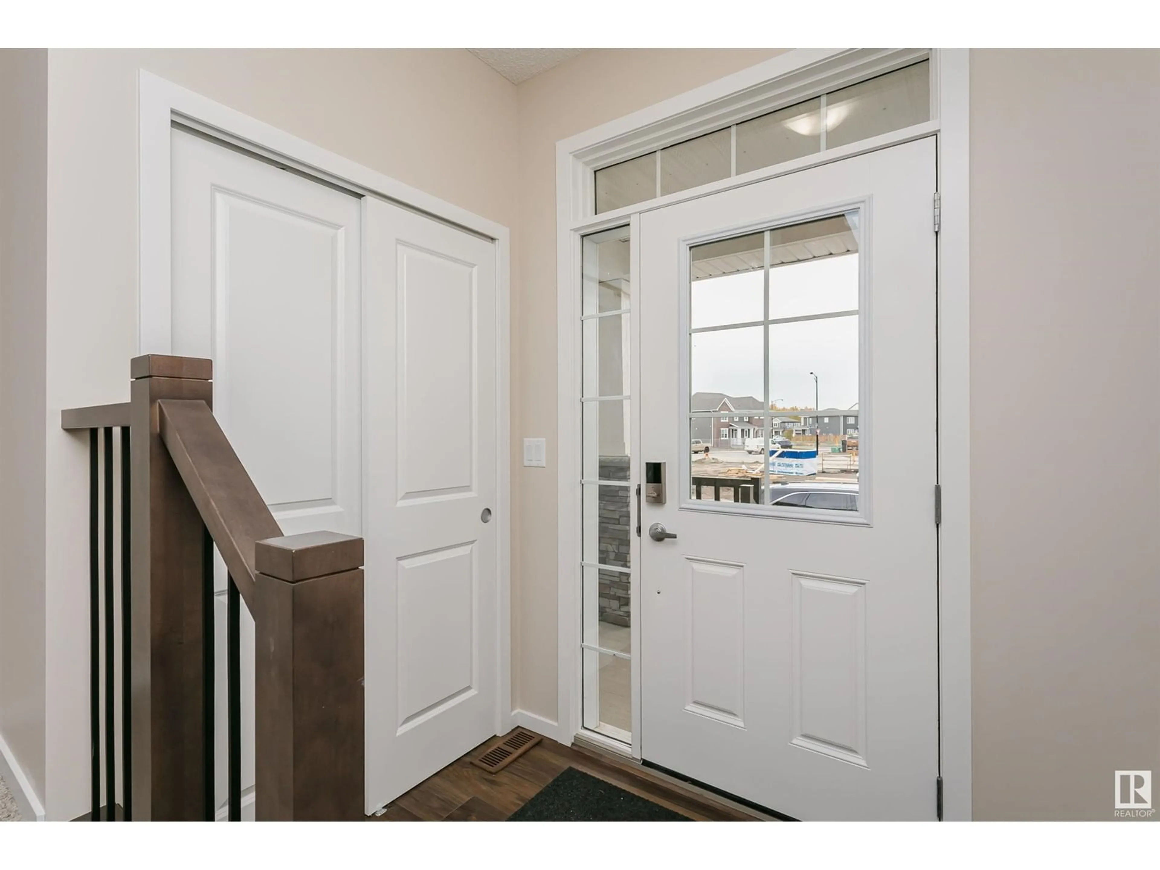 Indoor entryway, wood floors for 20516 22 AV NW, Edmonton Alberta T6M1N1