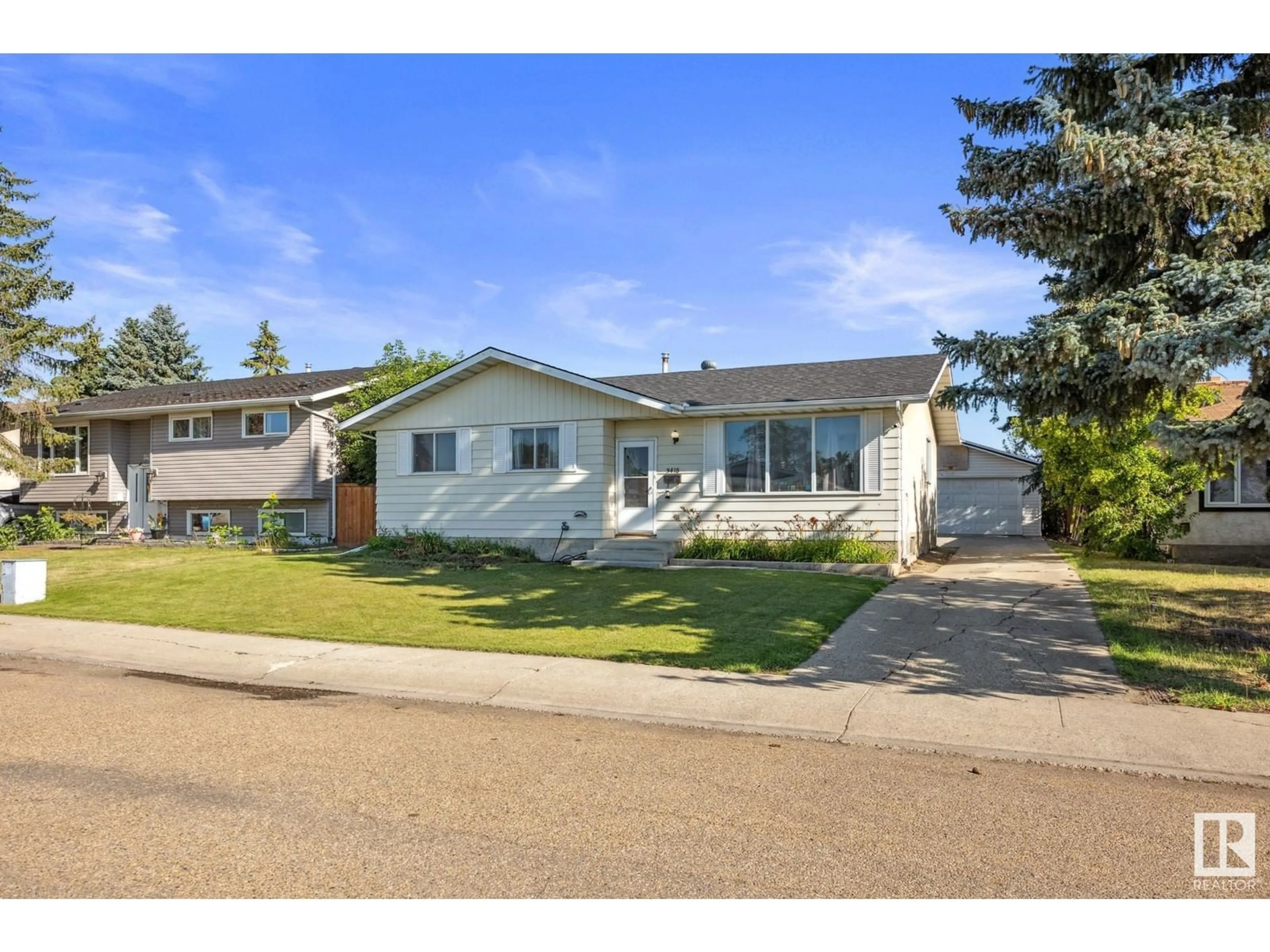 Frontside or backside of a home for 3418 135A AV NW, Edmonton Alberta T5A2V9