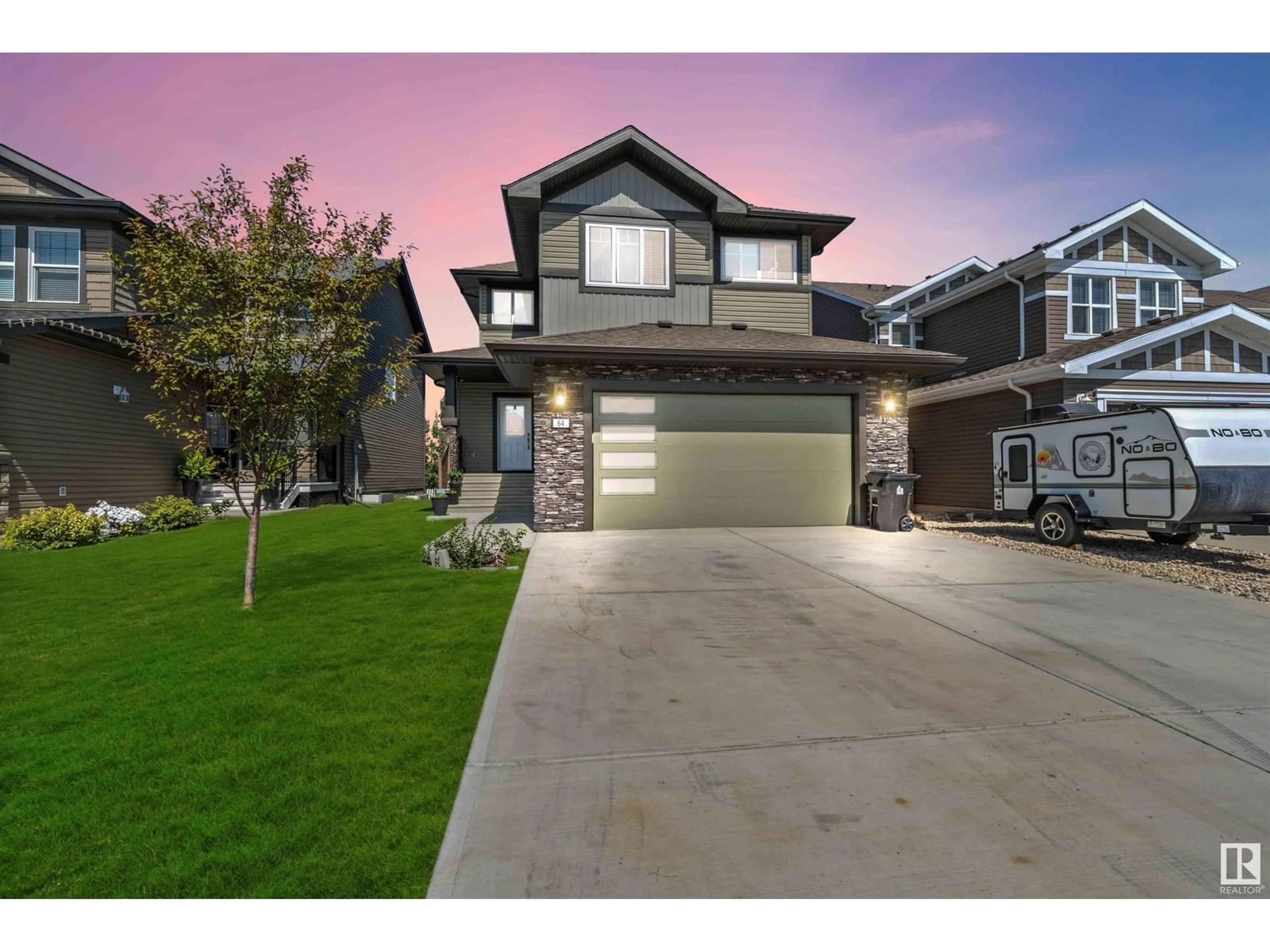 Frontside or backside of a home for 64 Meadowland Way, Spruce Grove Alberta T7X0S4