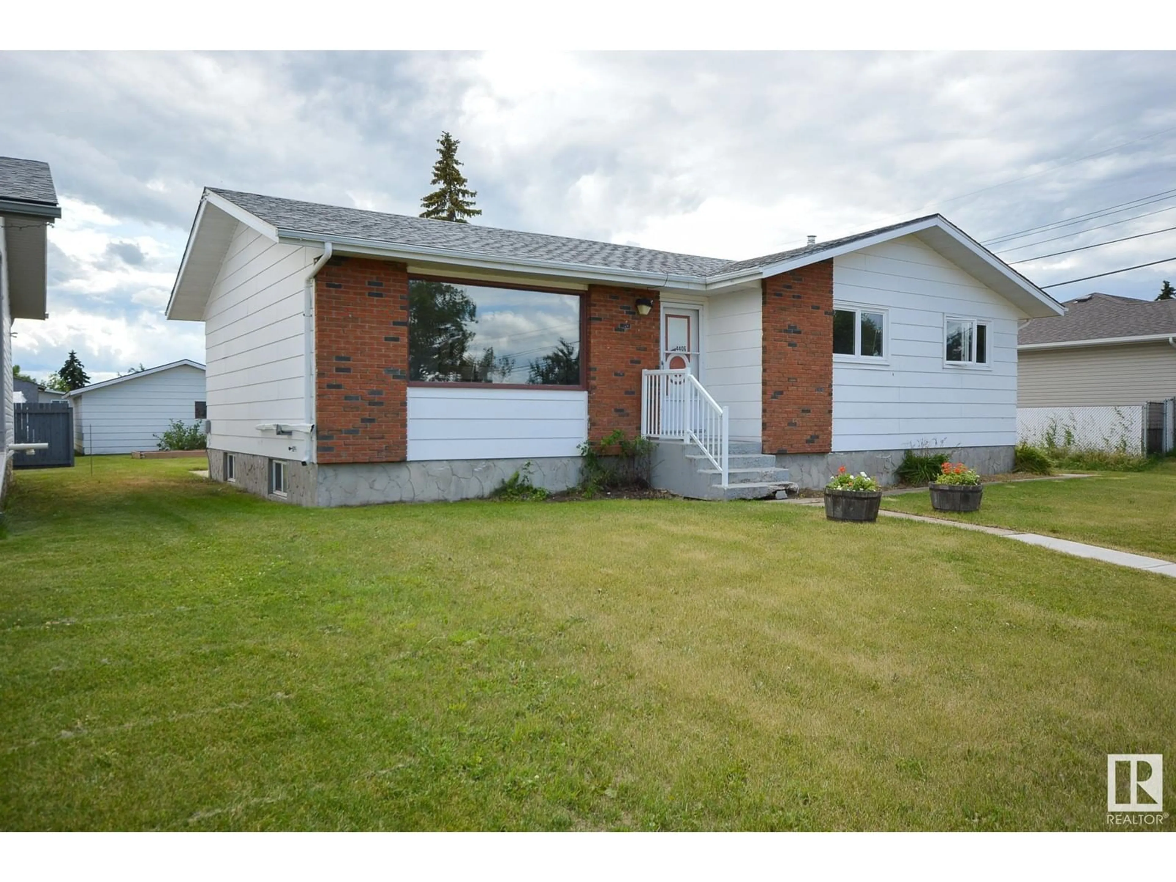 Frontside or backside of a home for 4406 47 Ave, Bonnyville Town Alberta T9N1H3