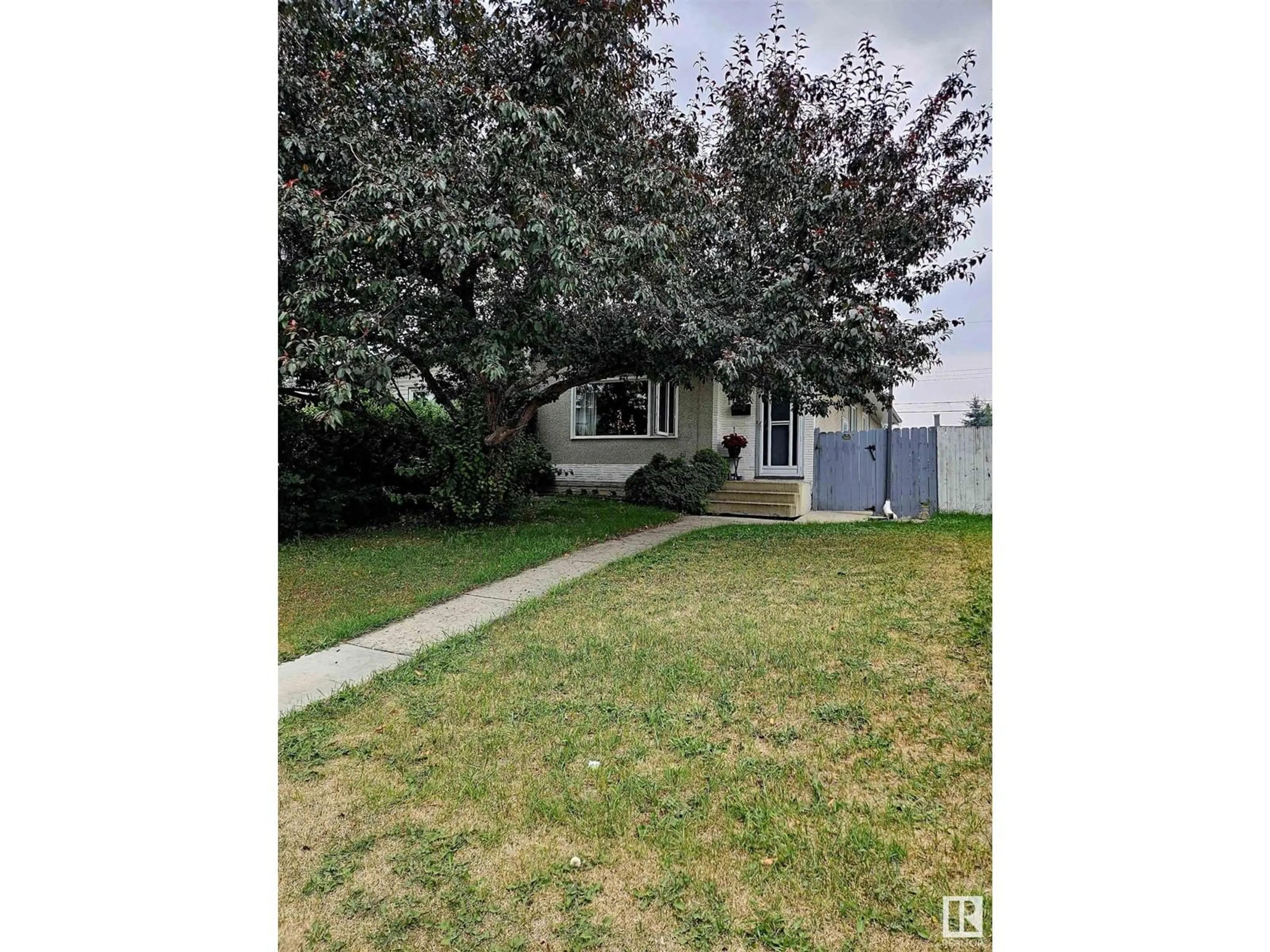 Frontside or backside of a home for 11418 41 AV NW, Edmonton Alberta T6J0T8