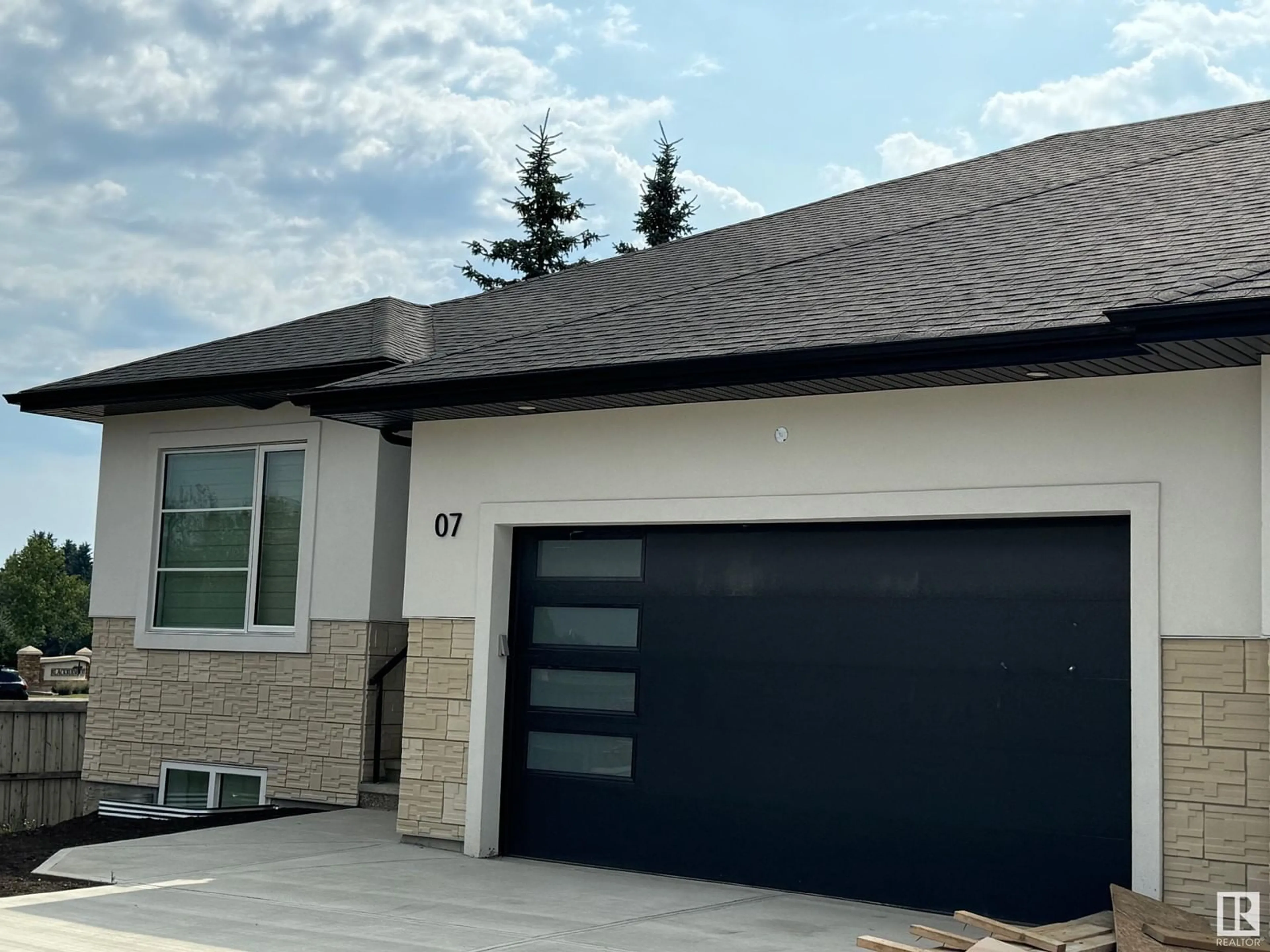 Frontside or backside of a home for #7 604 MCALLISTER LO SW, Edmonton Alberta T6W1K8