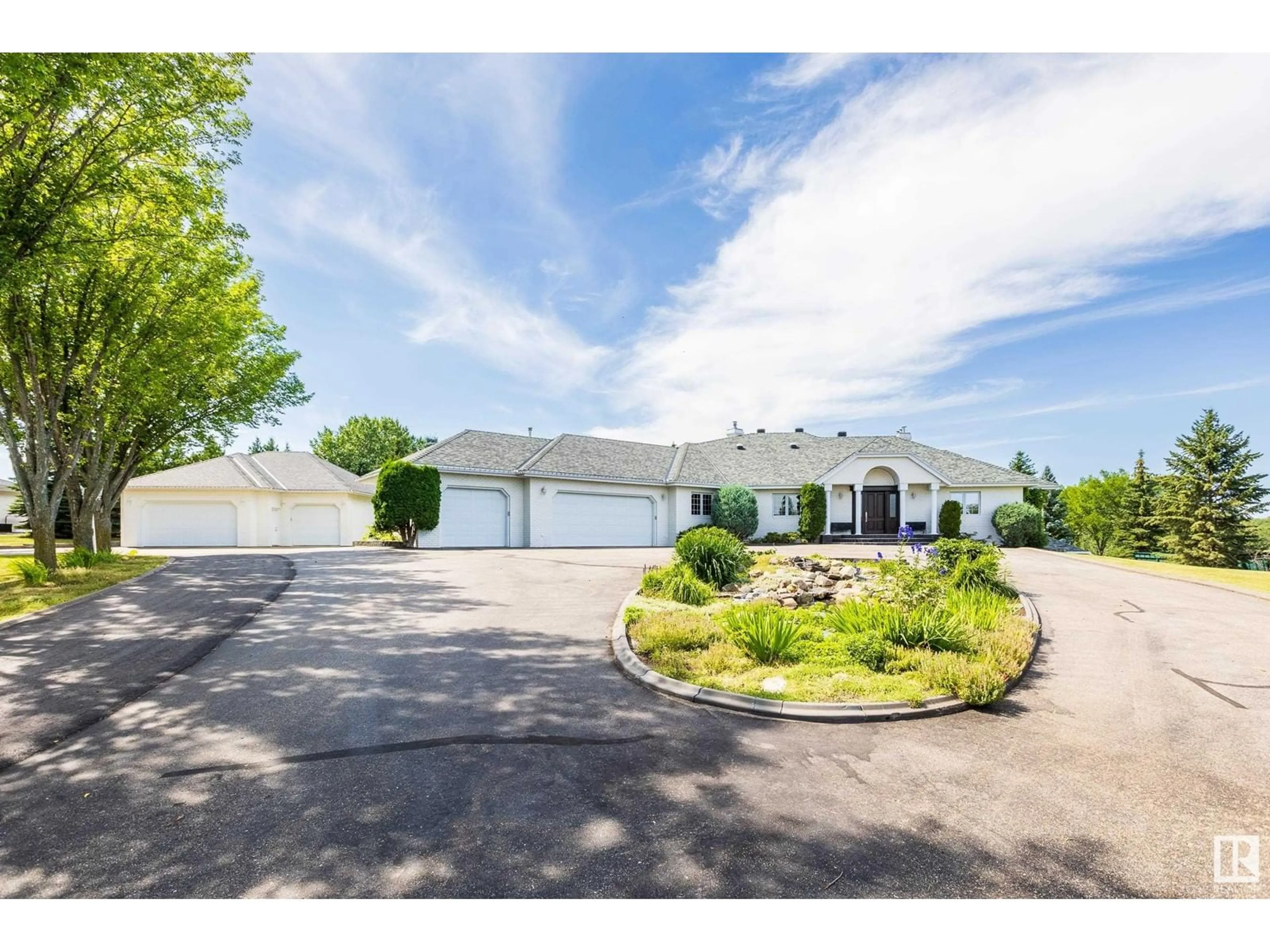 A pic from outside/outdoor area/front of a property/back of a property/a pic from drone, unknown for 194 52319 RGE RD 231, Rural Strathcona County Alberta T8A1A8