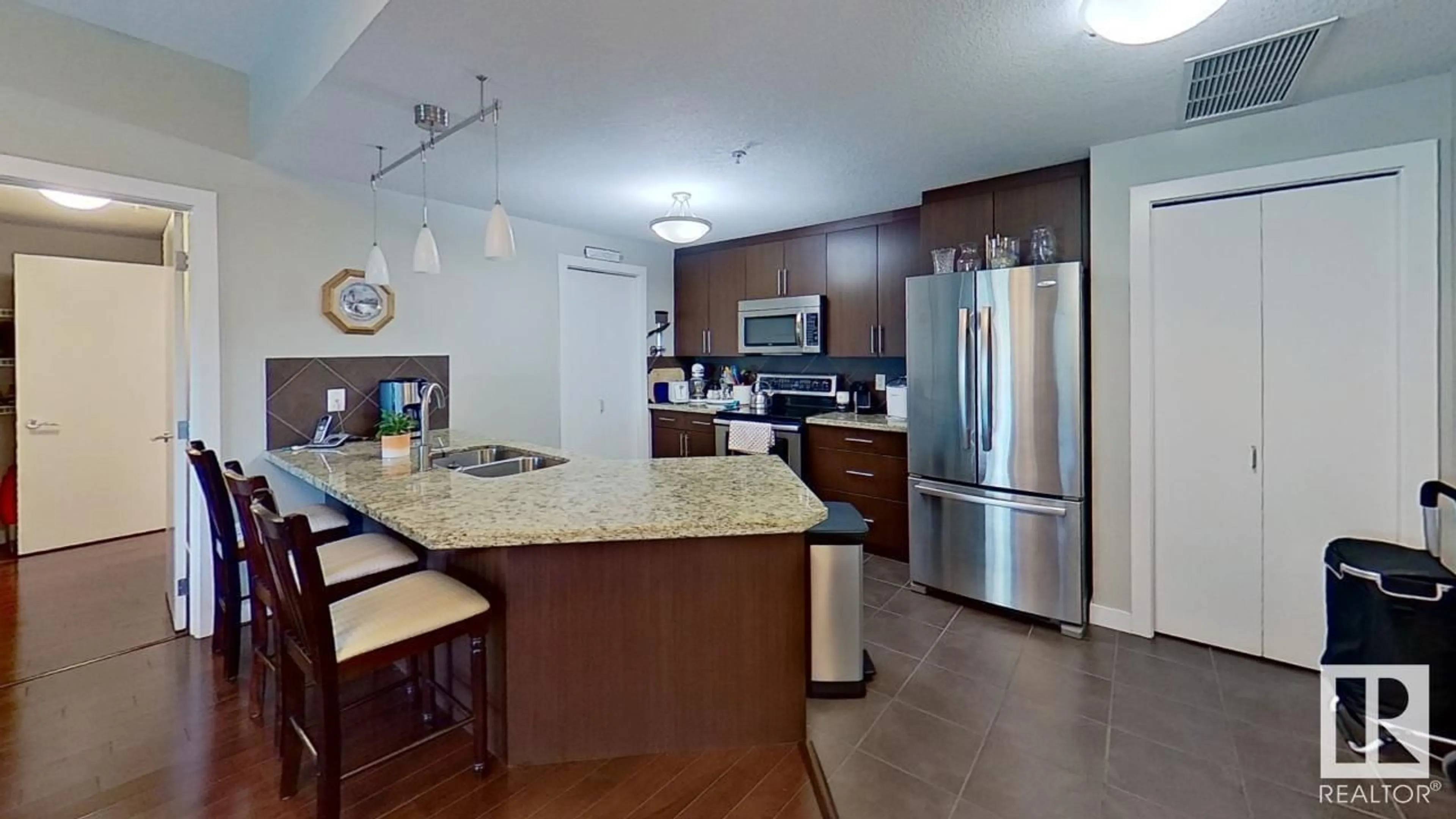 Open concept kitchen for #807 10055 118 ST NW, Edmonton Alberta T5K0C1