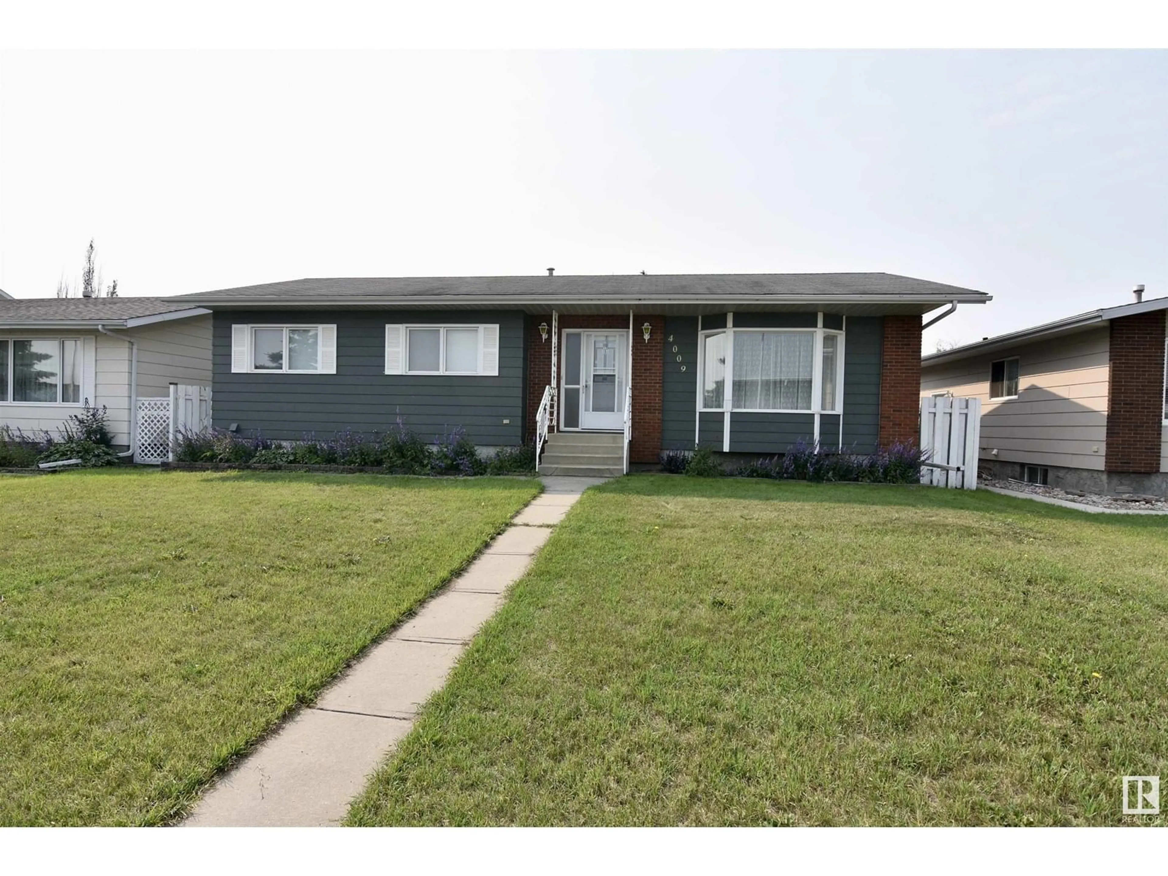 Frontside or backside of a home for 4009 48 AV, St. Paul Town Alberta T0A3A2