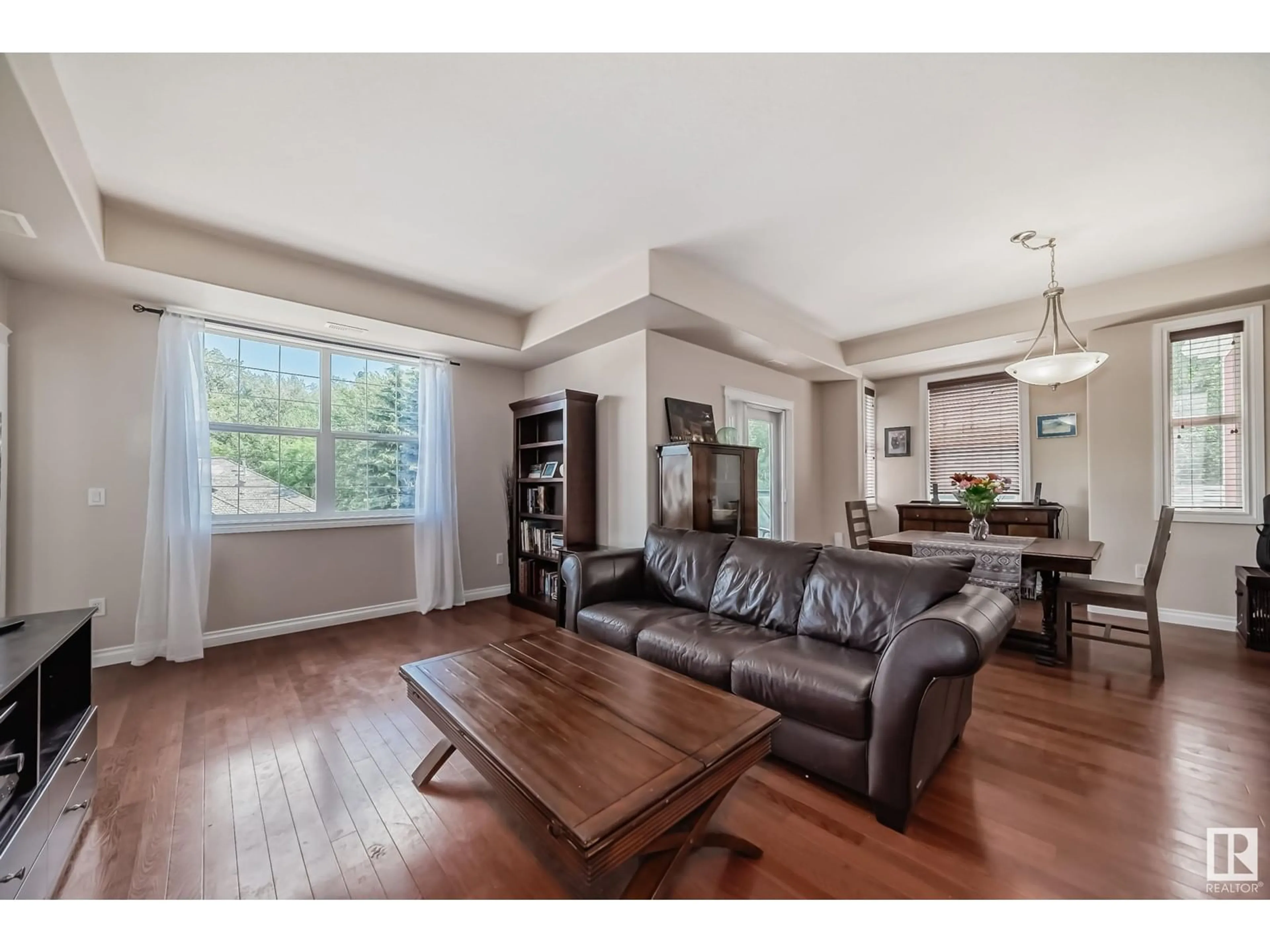 Living room, wood floors for #313 9739 92 ST NW, Edmonton Alberta T6C3S3