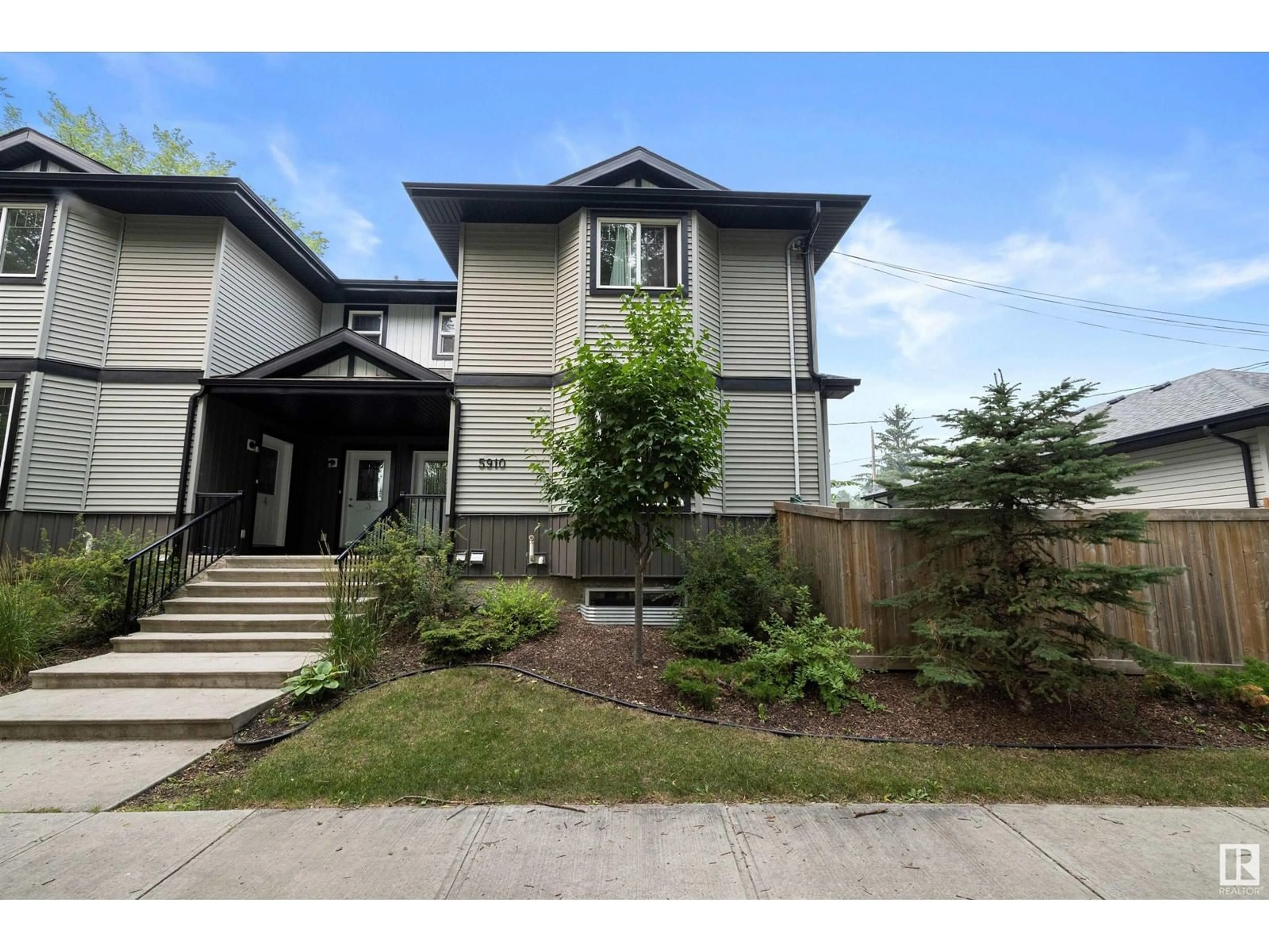 A pic from exterior of the house or condo for 1 5910 121 AV NW, Edmonton Alberta T5W3E3