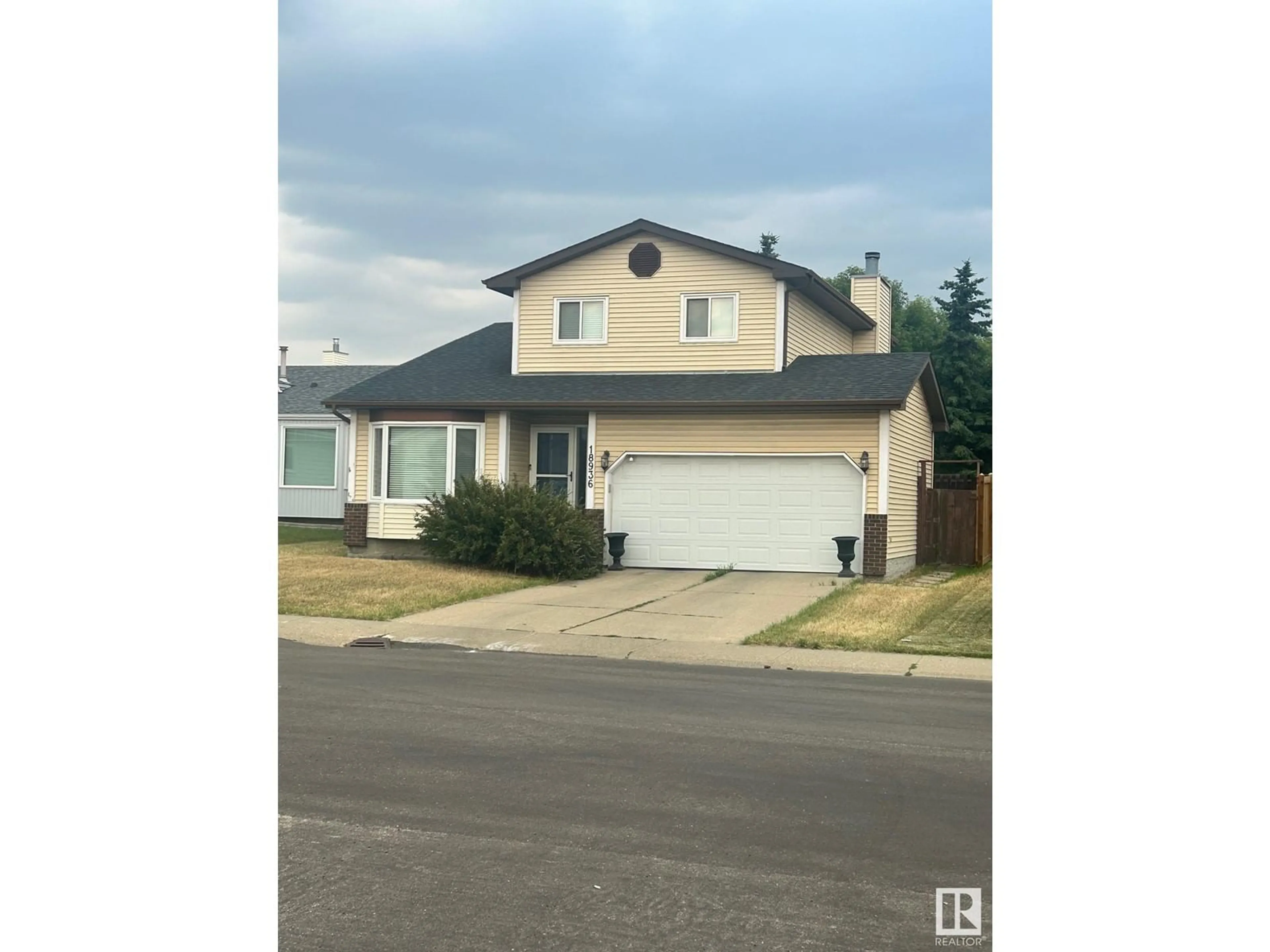 Frontside or backside of a home for 18936 80 AV NW, Edmonton Alberta T5T5C1