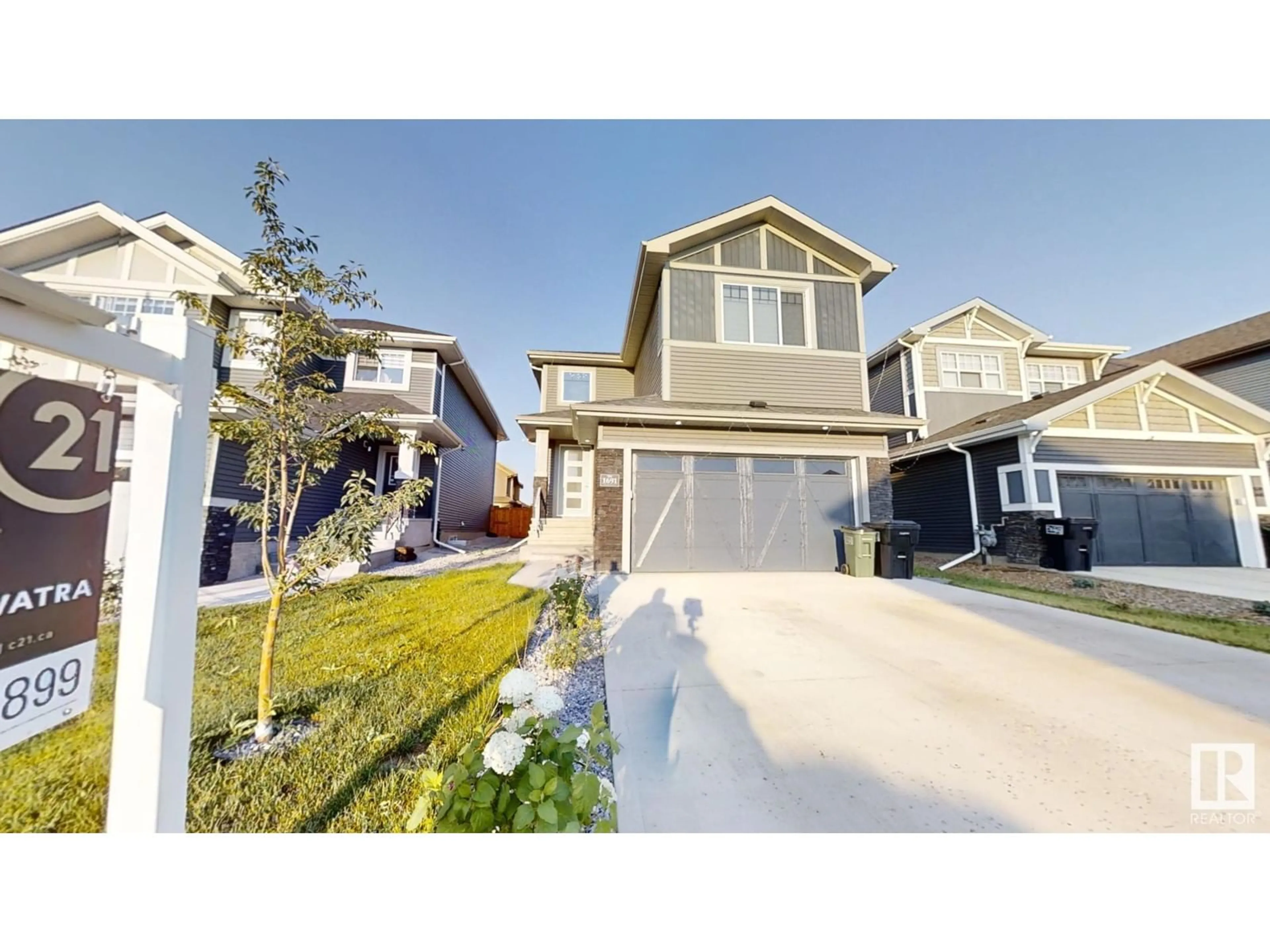 Frontside or backside of a home, the street view for 1691 Enright Way NW, Edmonton Alberta T6M0Z1