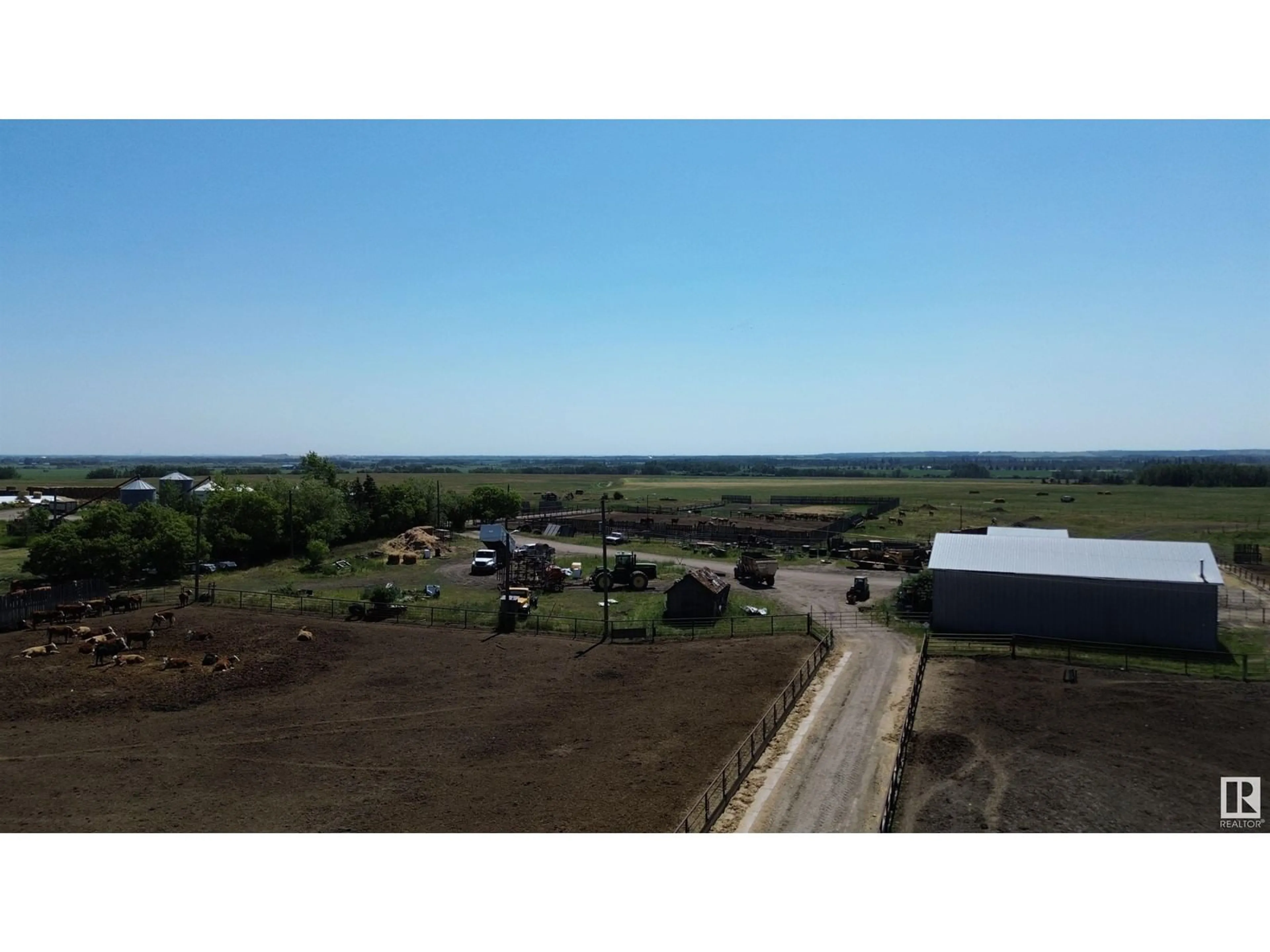 A pic from outside/outdoor area/front of a property/back of a property/a pic from drone, unknown for 55107 RGE RD 271, Rural Sturgeon County Alberta T8R1W4