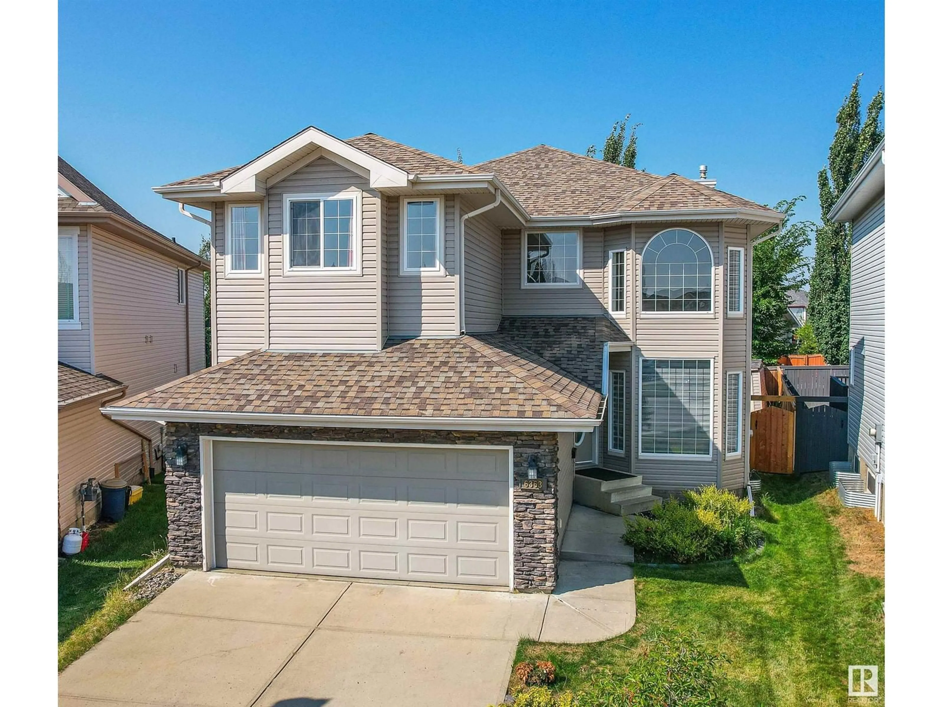 Frontside or backside of a home, the street view for 6353 SANDIN WY NW, Edmonton Alberta T6R0K1