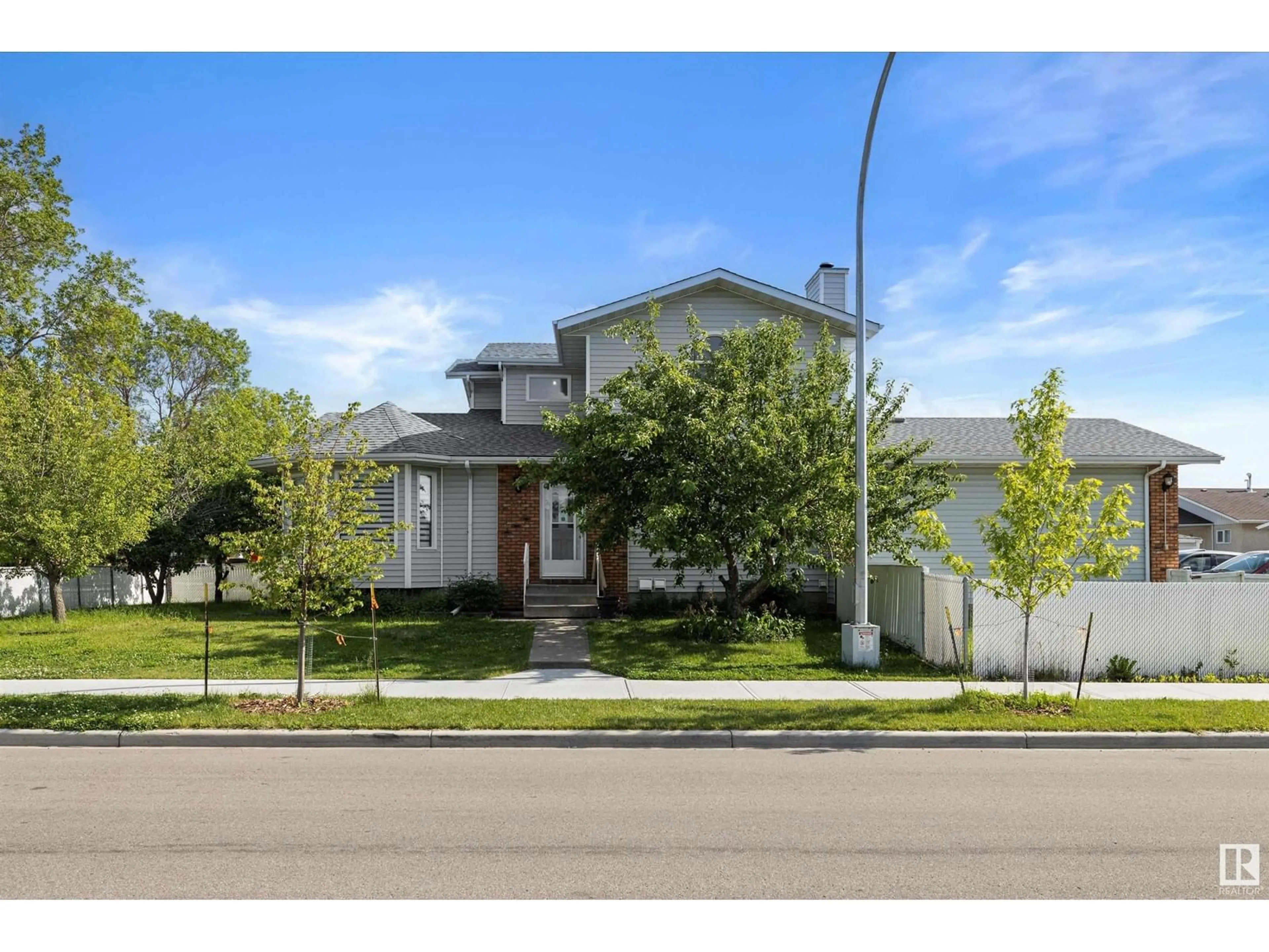 Frontside or backside of a home for 10003 161 AV NW, Edmonton Alberta T5X5V1