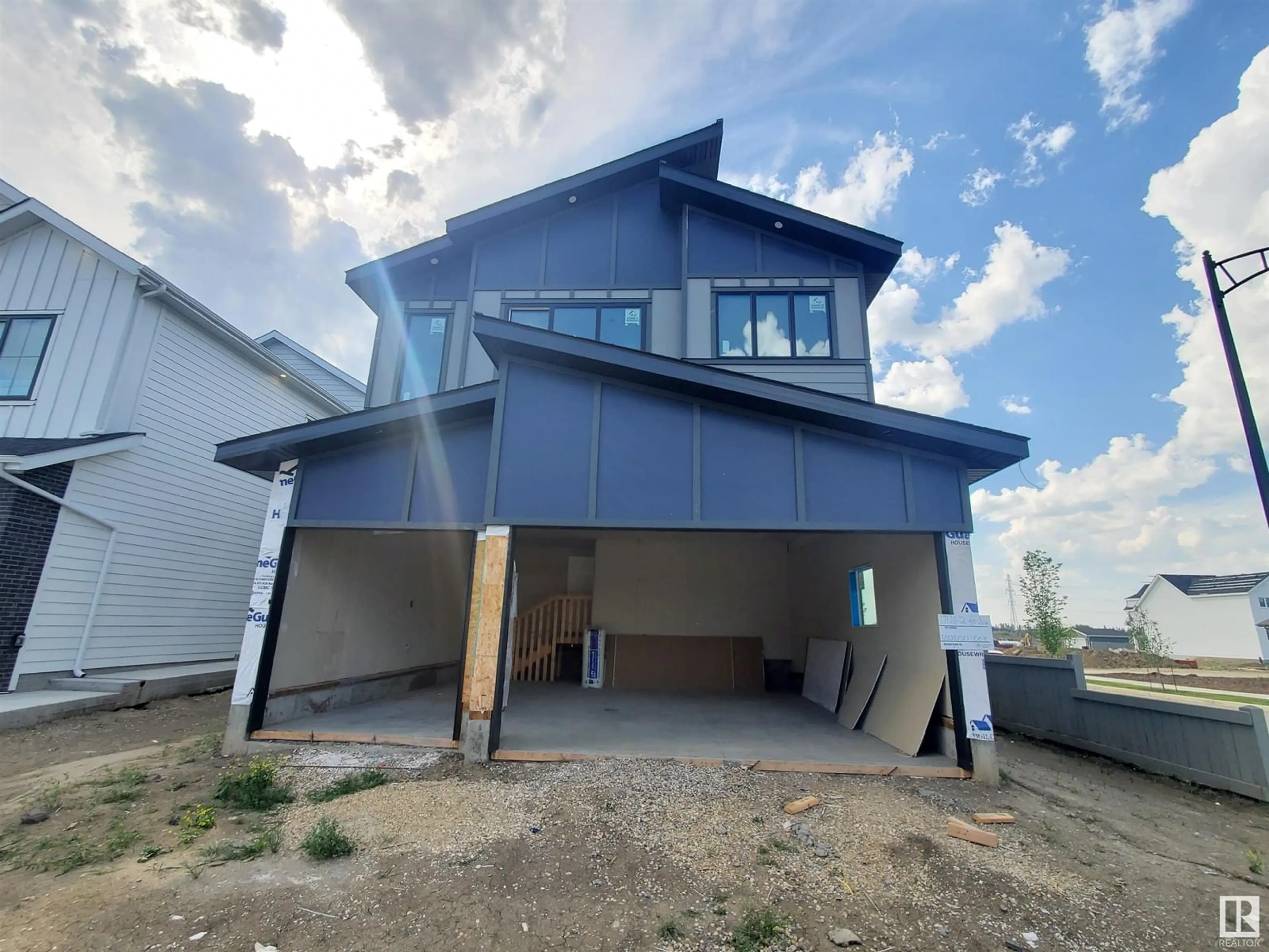 Frontside or backside of a home, the front or back of building for 17128 2 ST NW, Edmonton Alberta T5Y4G5