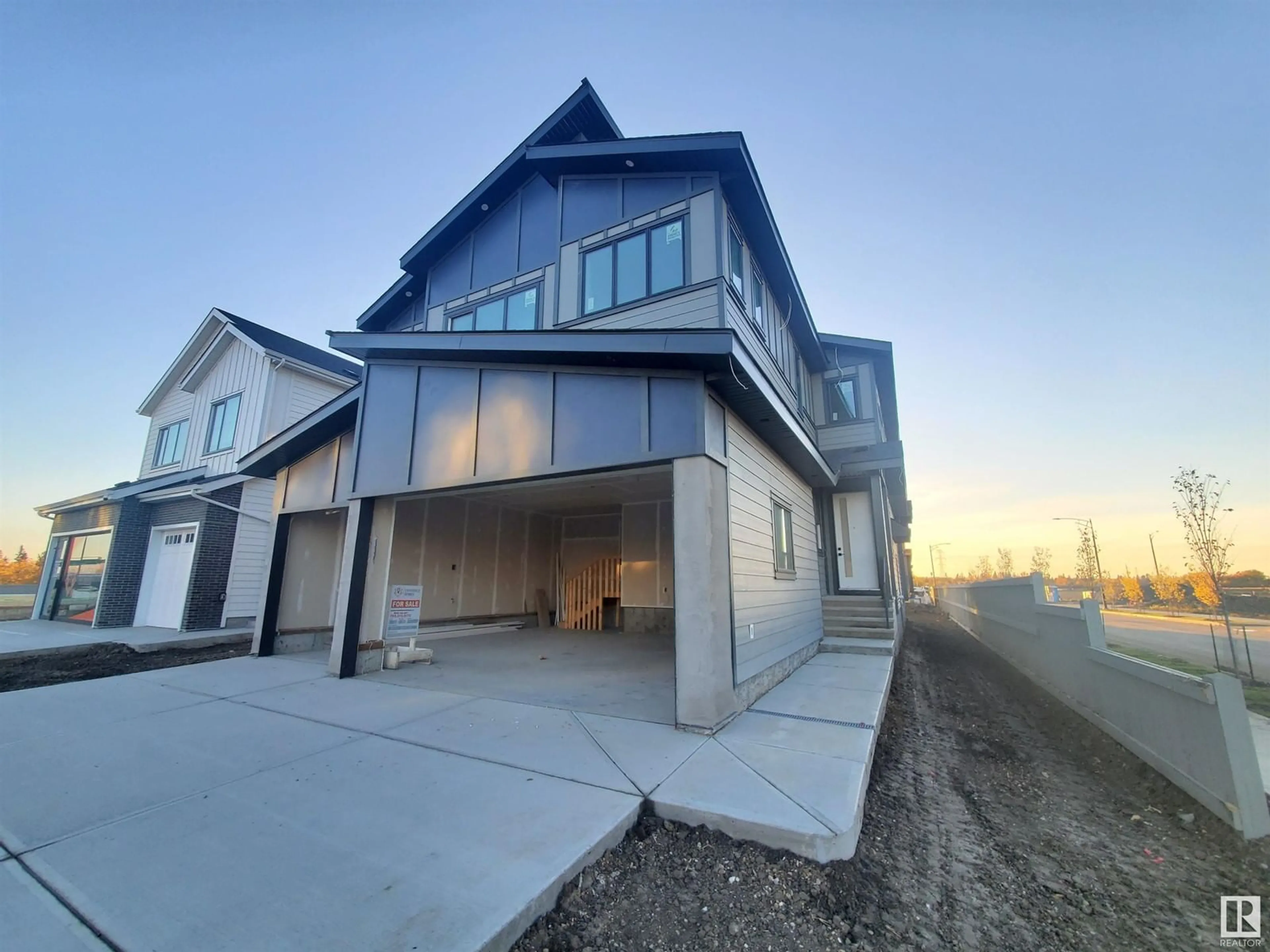 Frontside or backside of a home, the street view for 17128 2 ST NW, Edmonton Alberta T5Y4G5