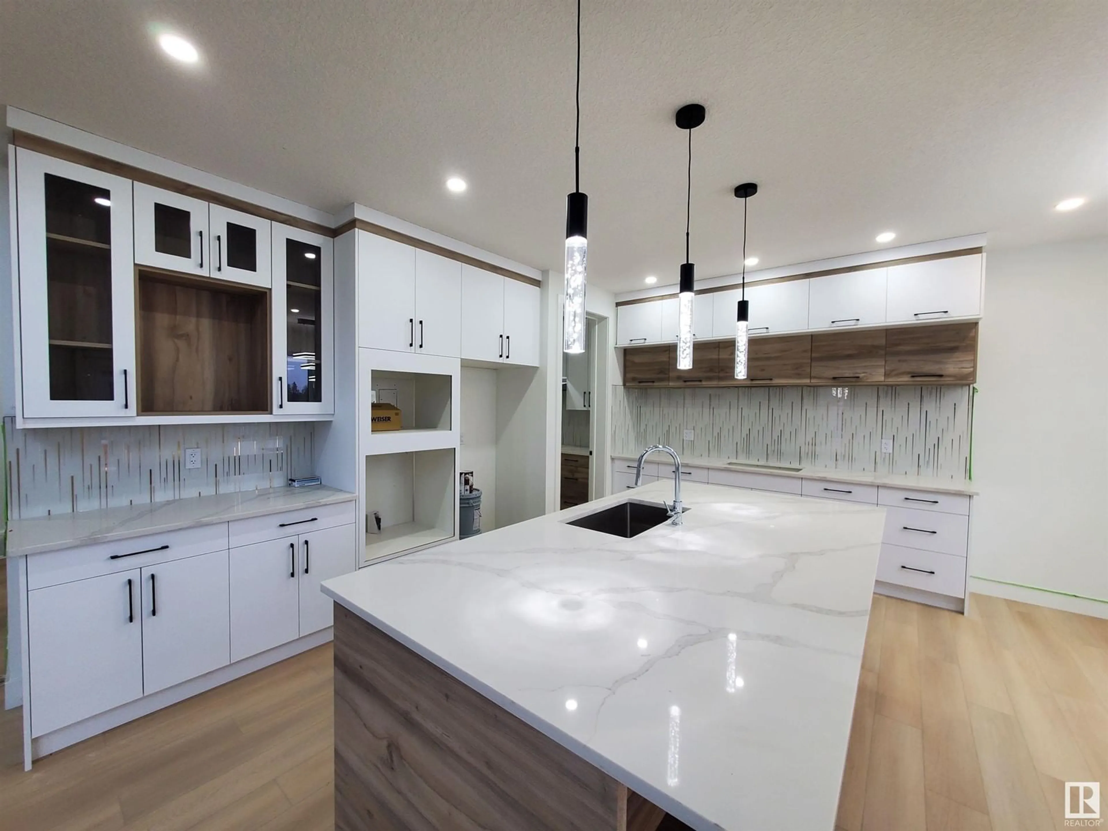 Contemporary kitchen, wood floors, mountain for 17128 2 ST NW, Edmonton Alberta T5Y4G5