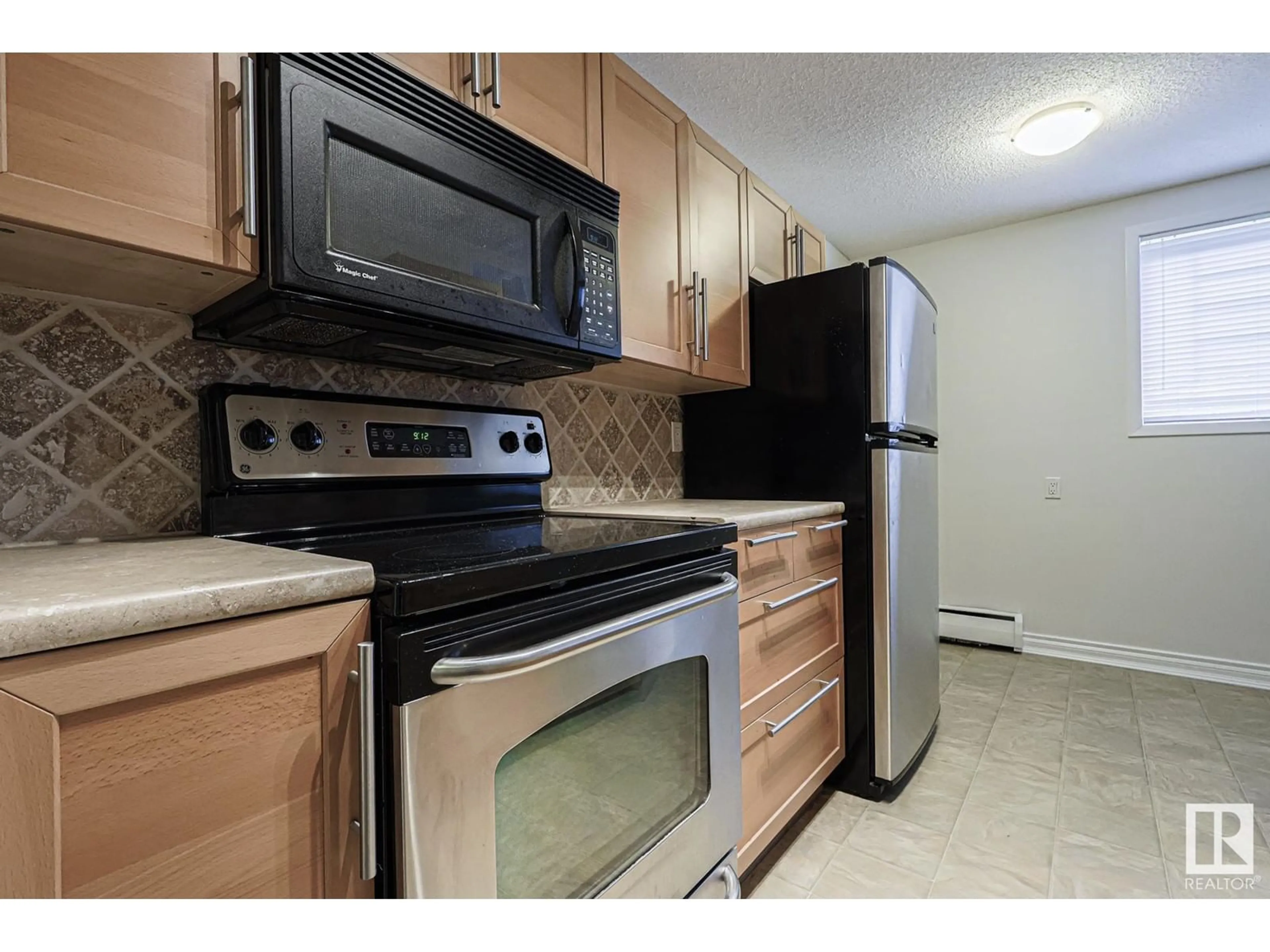 Standard kitchen for #3 10515 80 AV NW, Edmonton Alberta T6E2A4