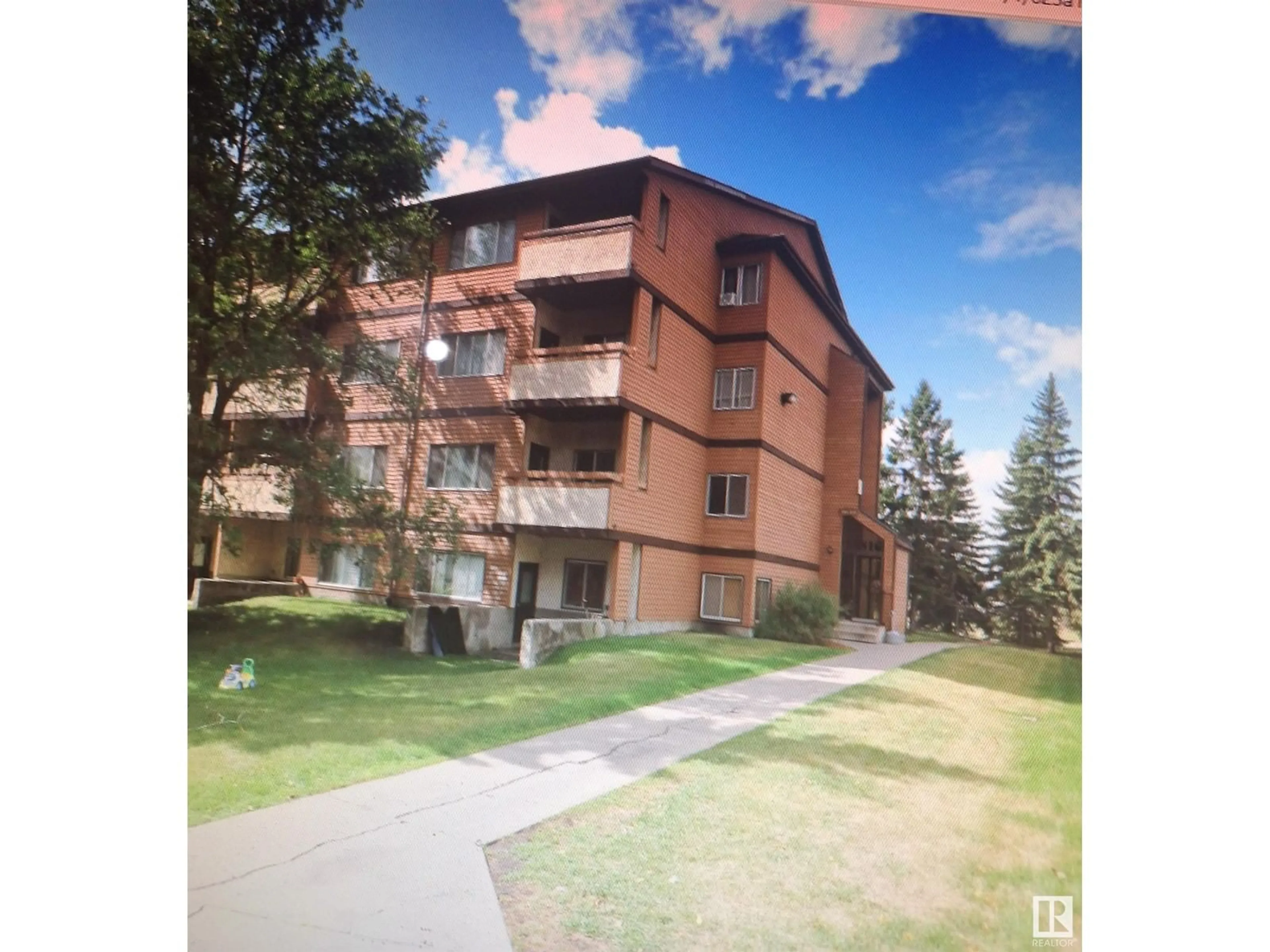 A pic from exterior of the house or condo, the street view for #203 14816 26 ST NW, Edmonton Alberta T5Y2G4