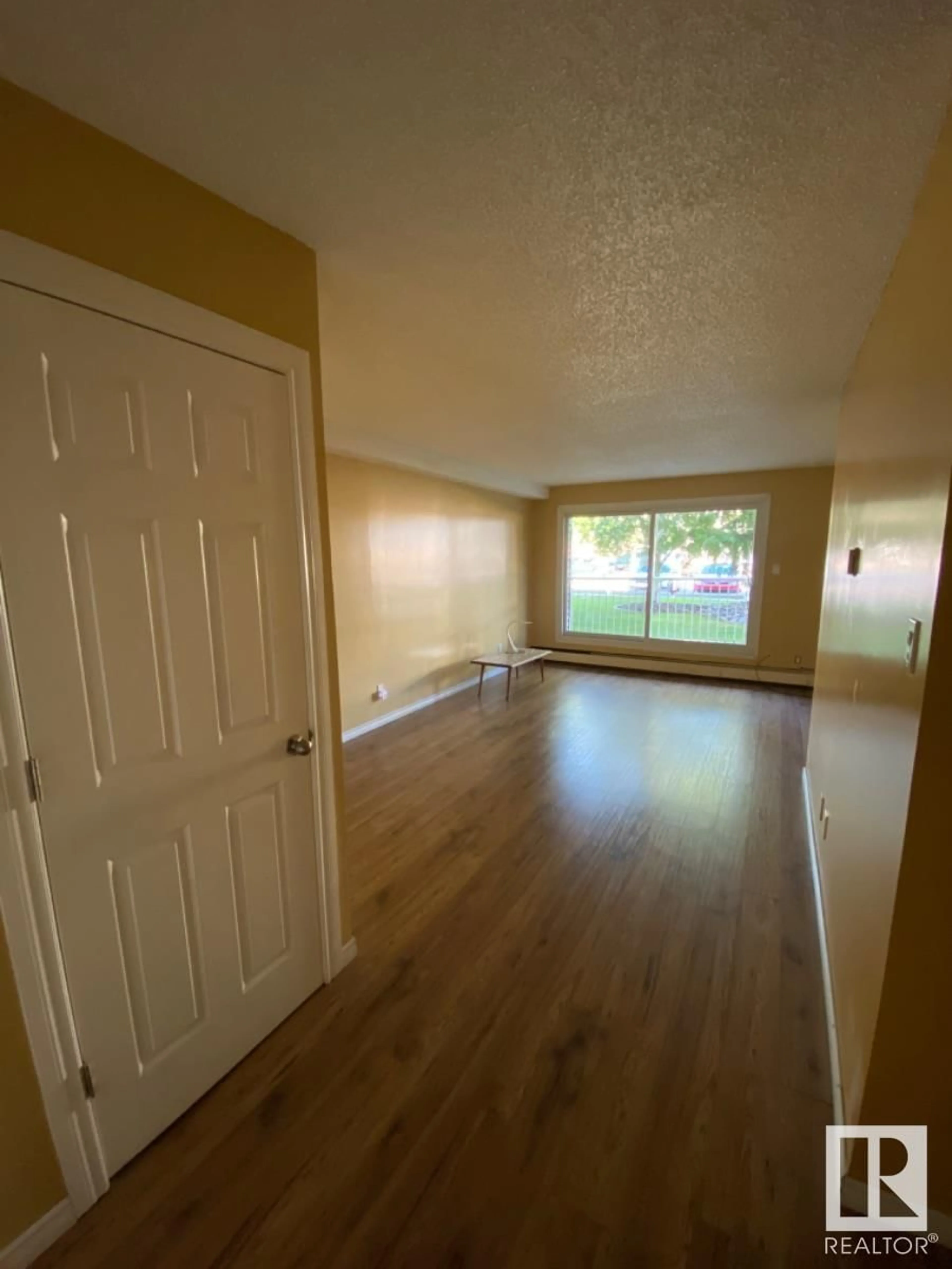 A pic of a room, wood floors for #105 10111 160 ST NW, Edmonton Alberta T5P3E8