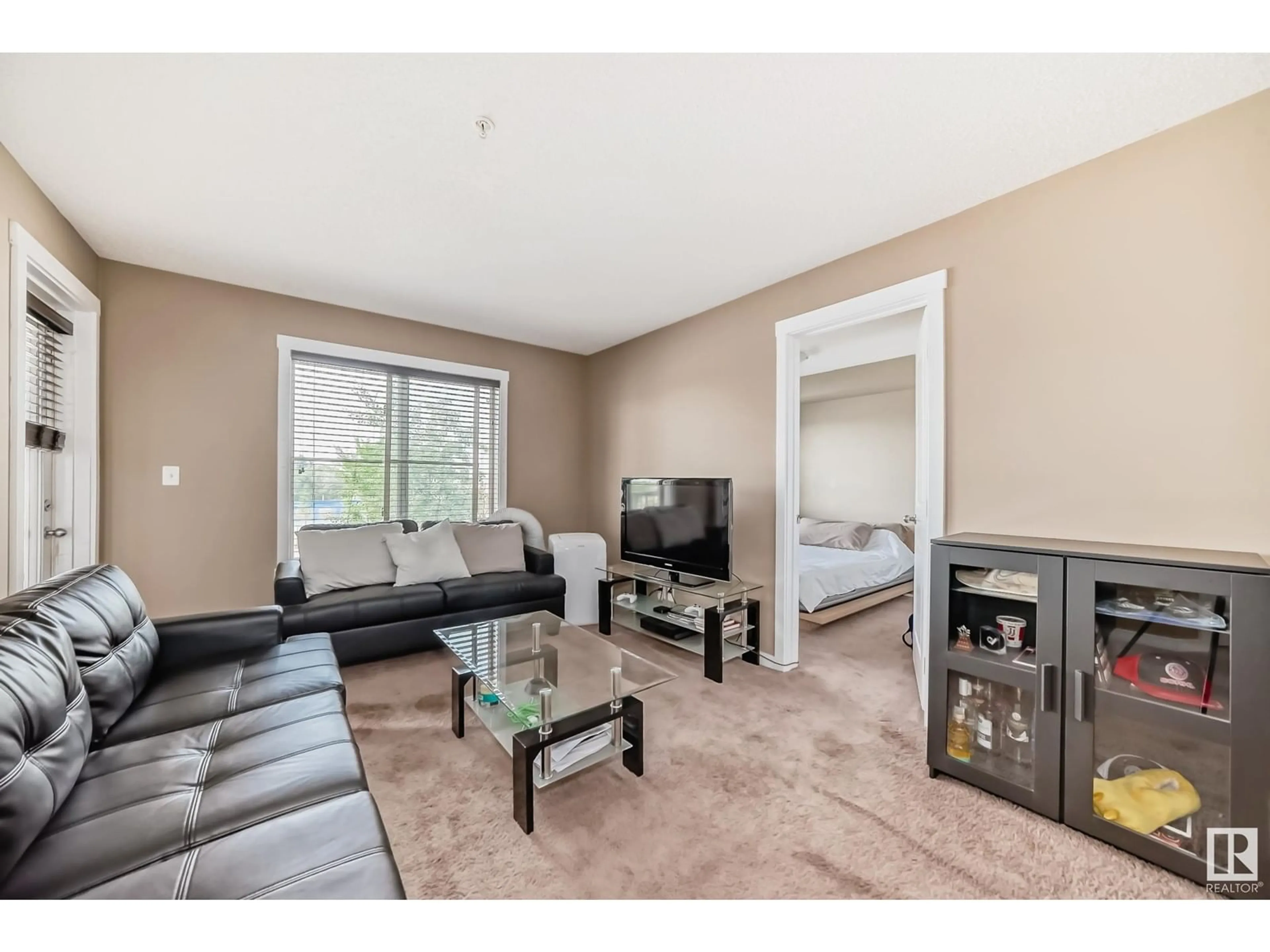 Living room for #209 3211 JAMES MOWATT TR SW, Edmonton Alberta T6W3L6