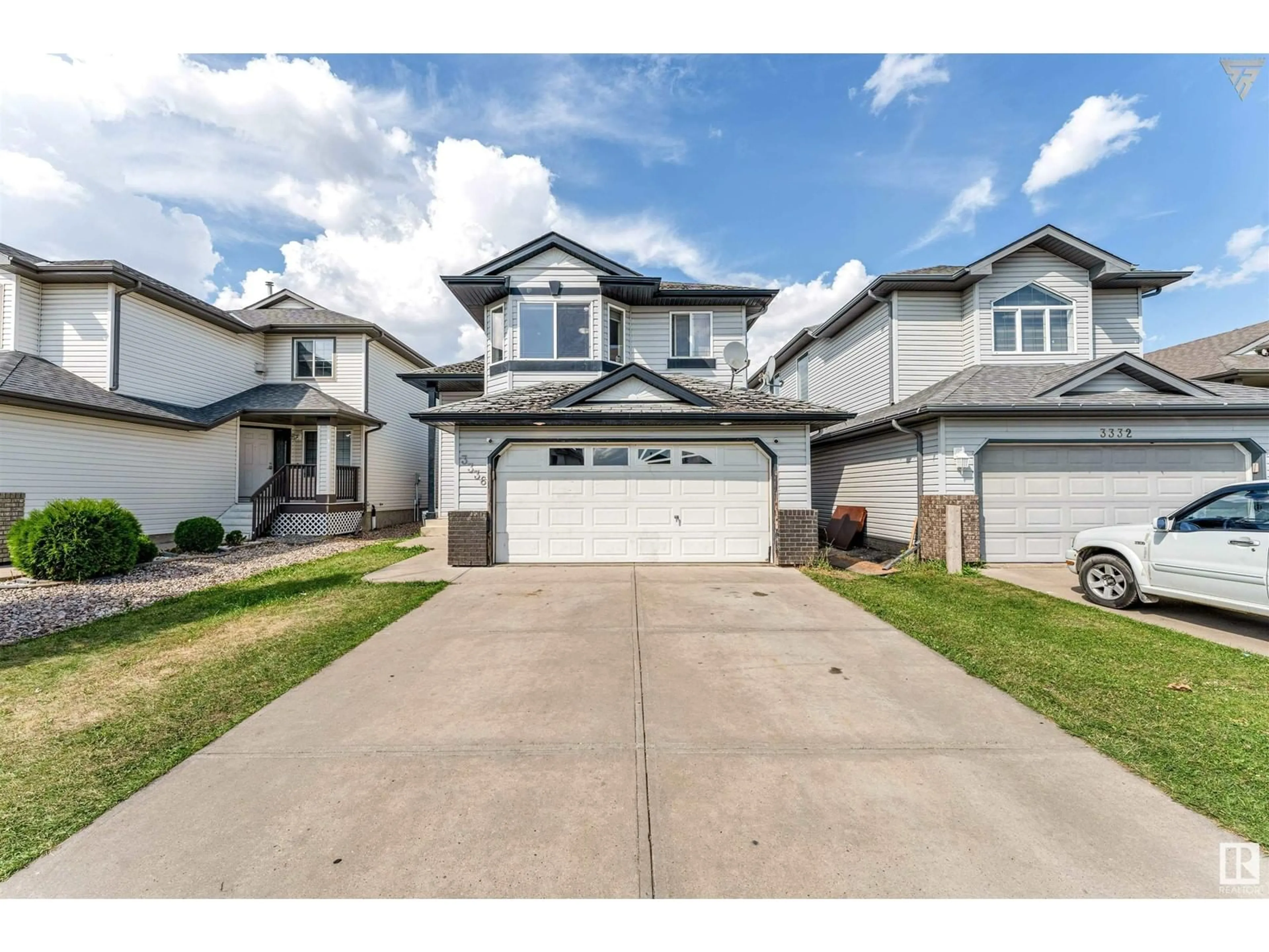 Frontside or backside of a home for 3336 24 AV NW, Edmonton Alberta T6T1Y6