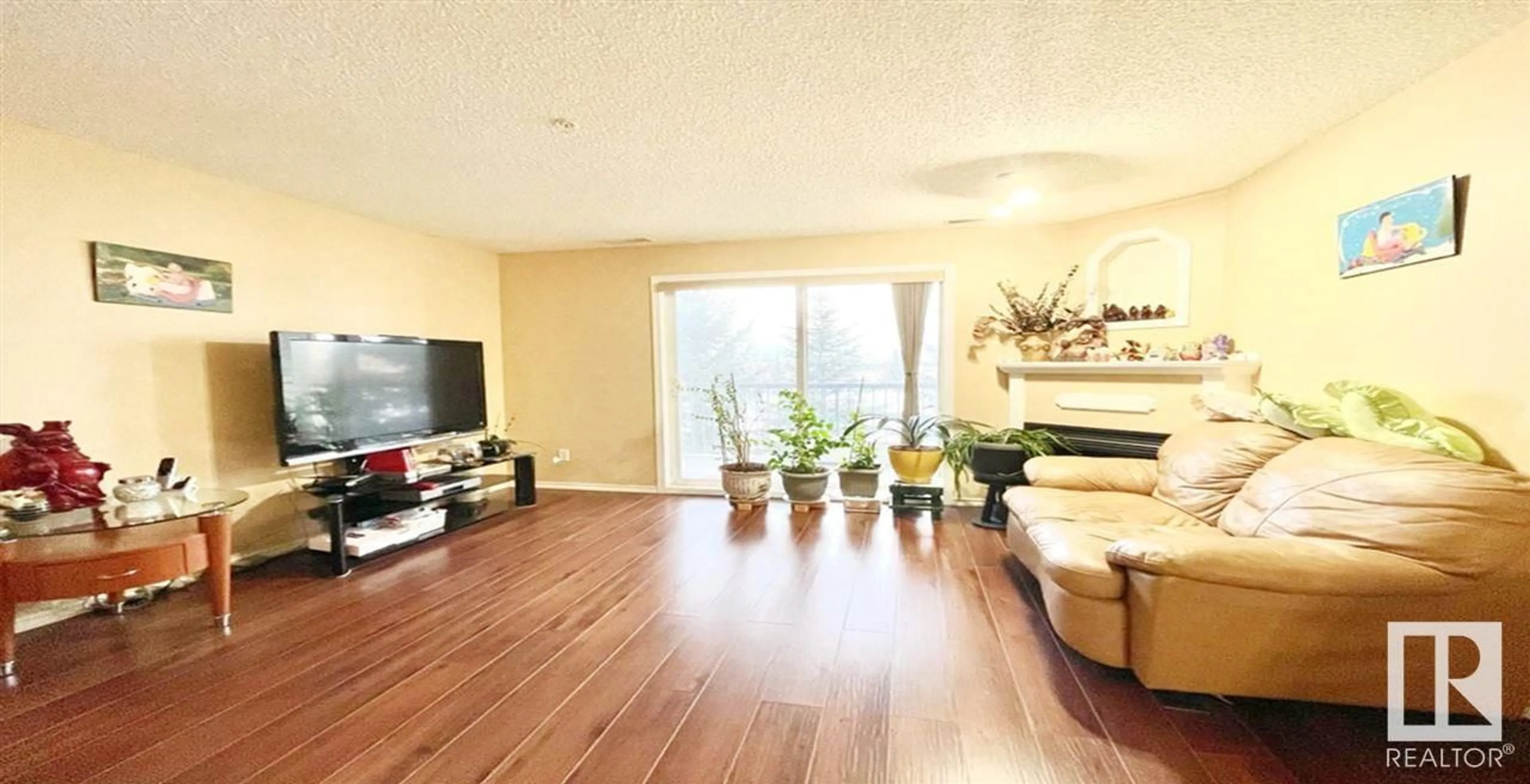 Living room, wood floors for #237 16311 95 ST NW, Edmonton Alberta T5Z3Y5