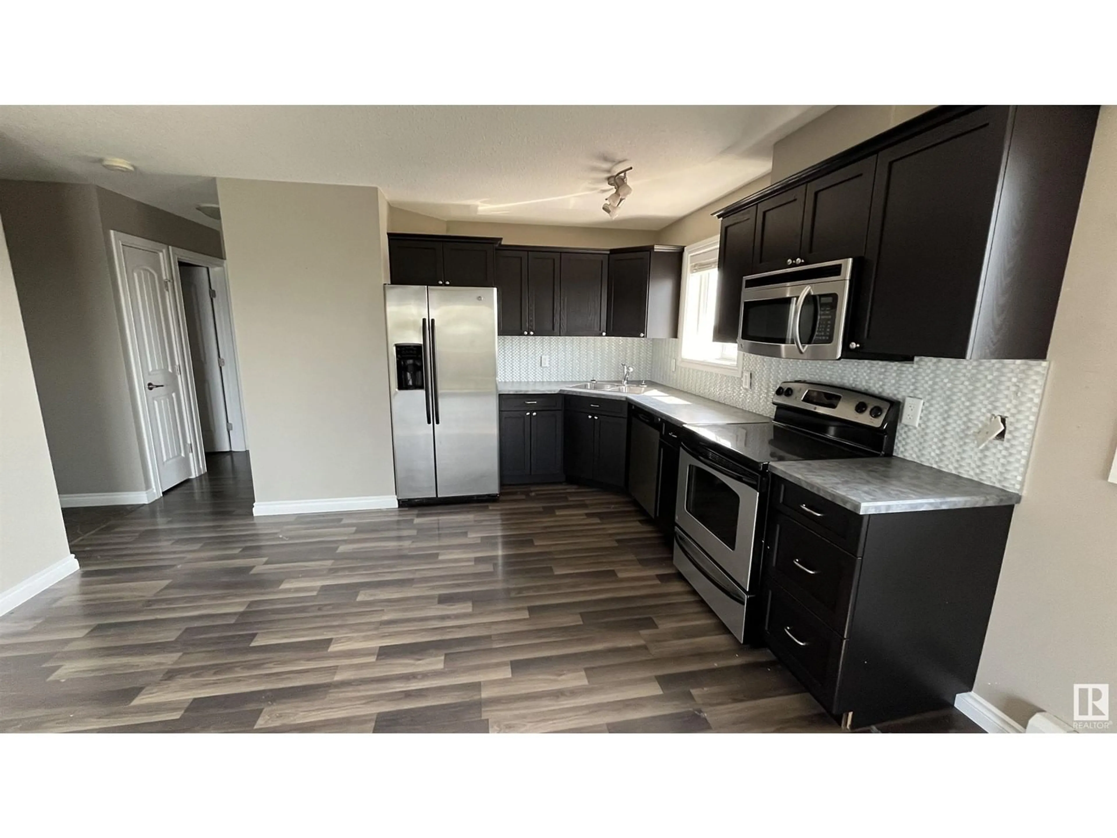 Open concept kitchen for #302 4318 50 AV, Bonnyville Town Alberta T9N0B5