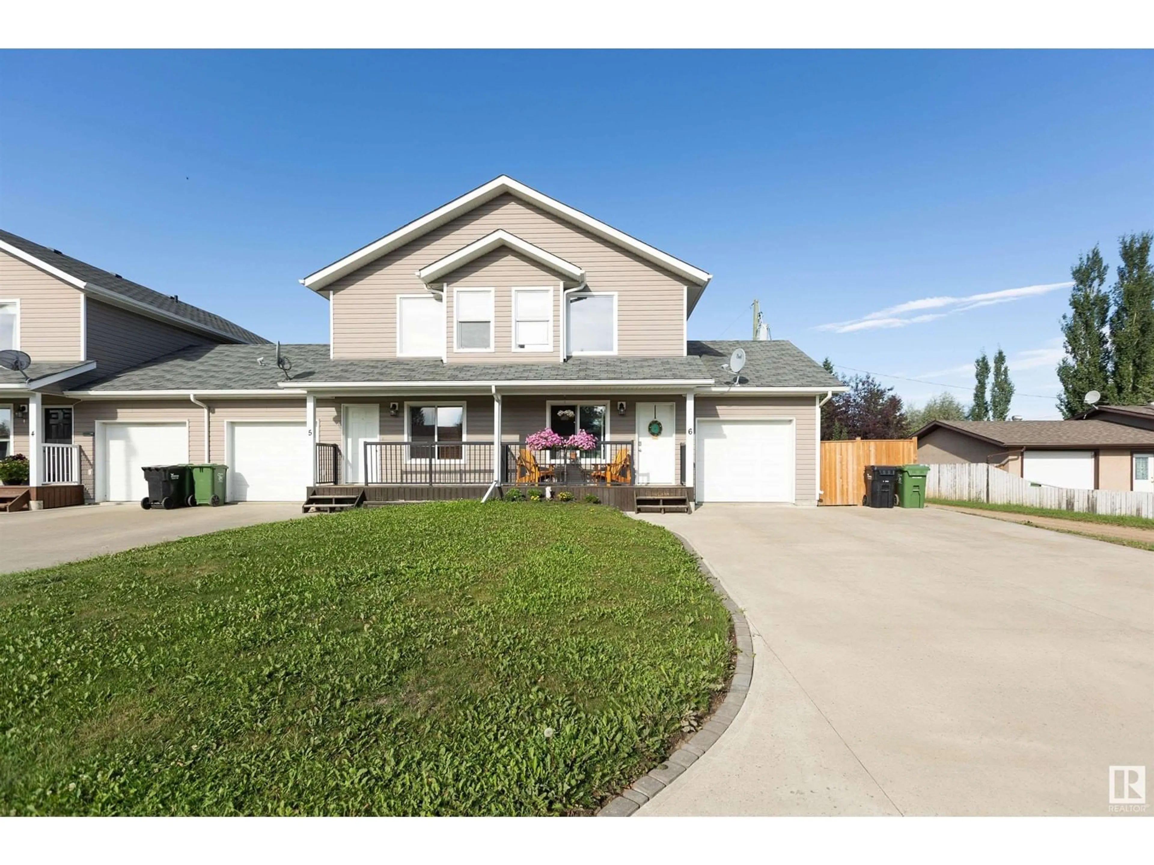 Frontside or backside of a home for 6 10560 103 ST, Westlock Alberta T7P1L2