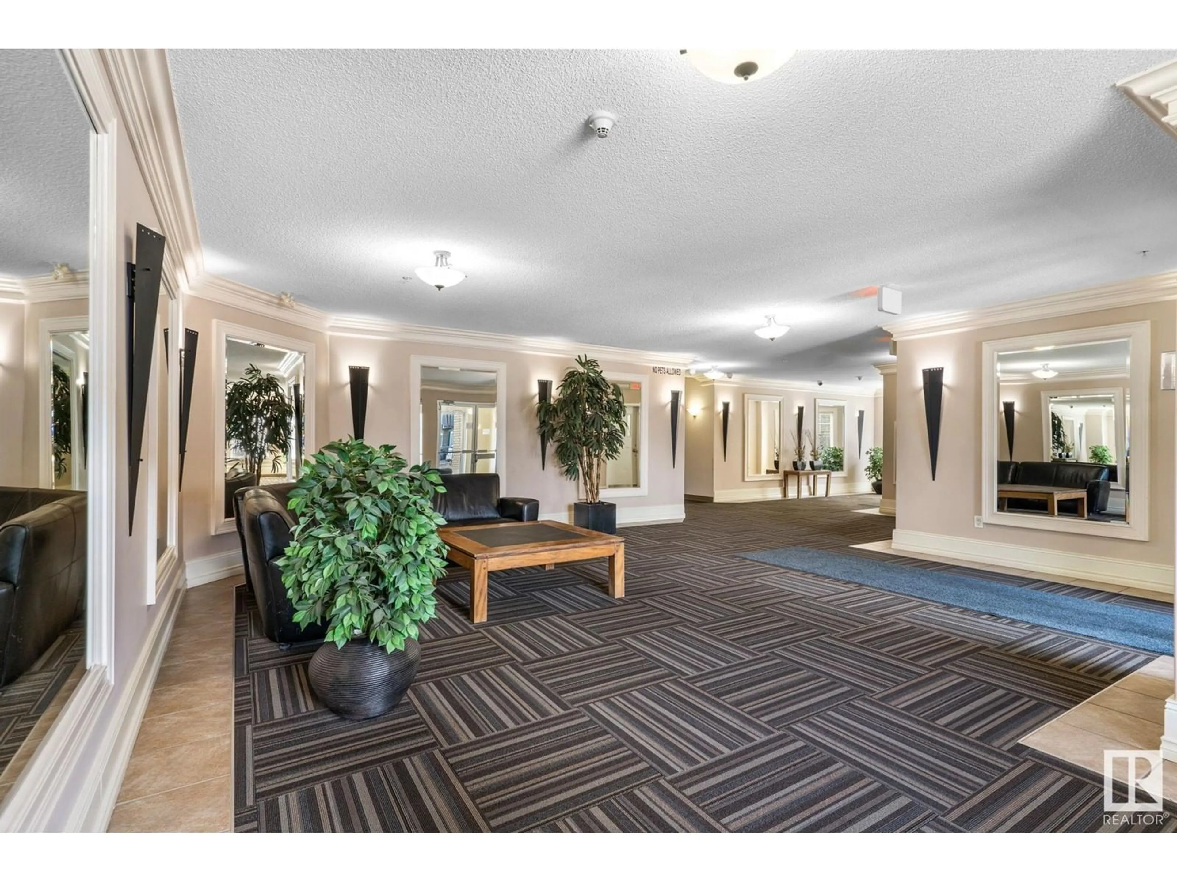 Indoor lobby, carpet floors for #304 16715 100 AV NW, Edmonton Alberta T5P4Z5