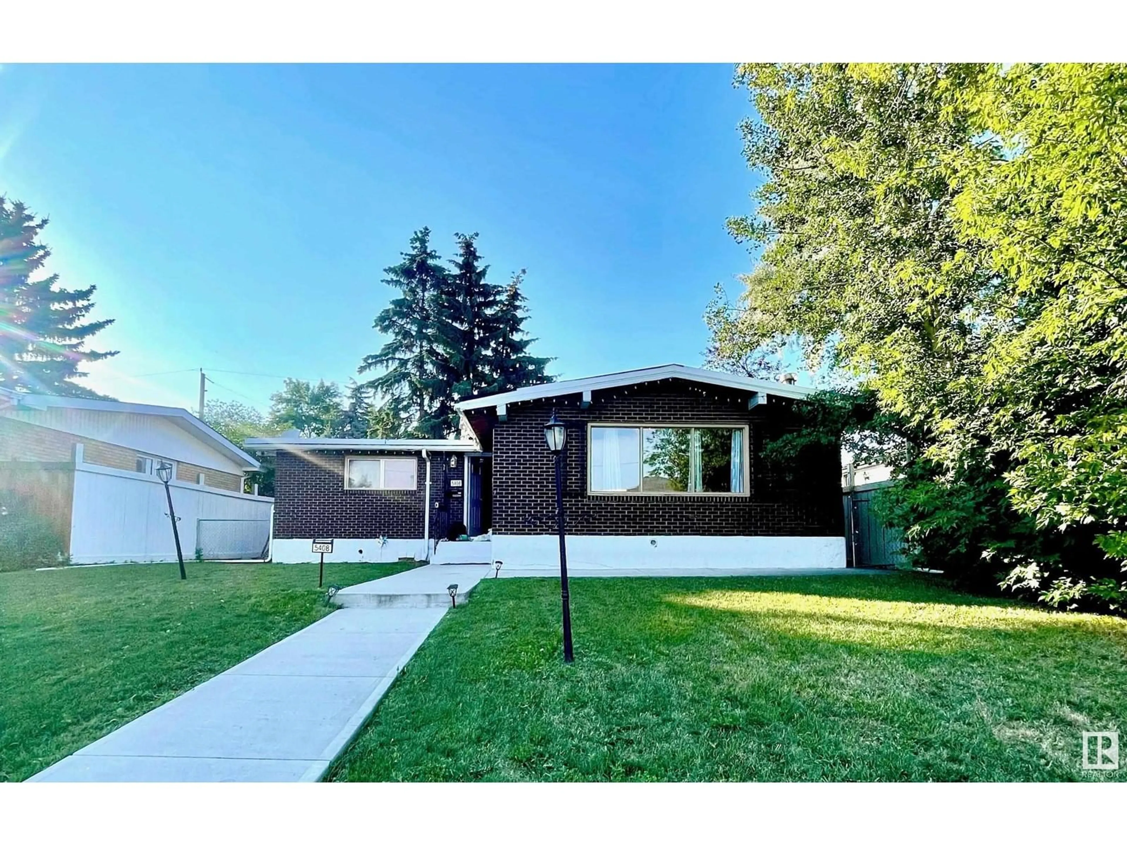 Frontside or backside of a home for 5408 139 AV NW, Edmonton Alberta T5A1E6