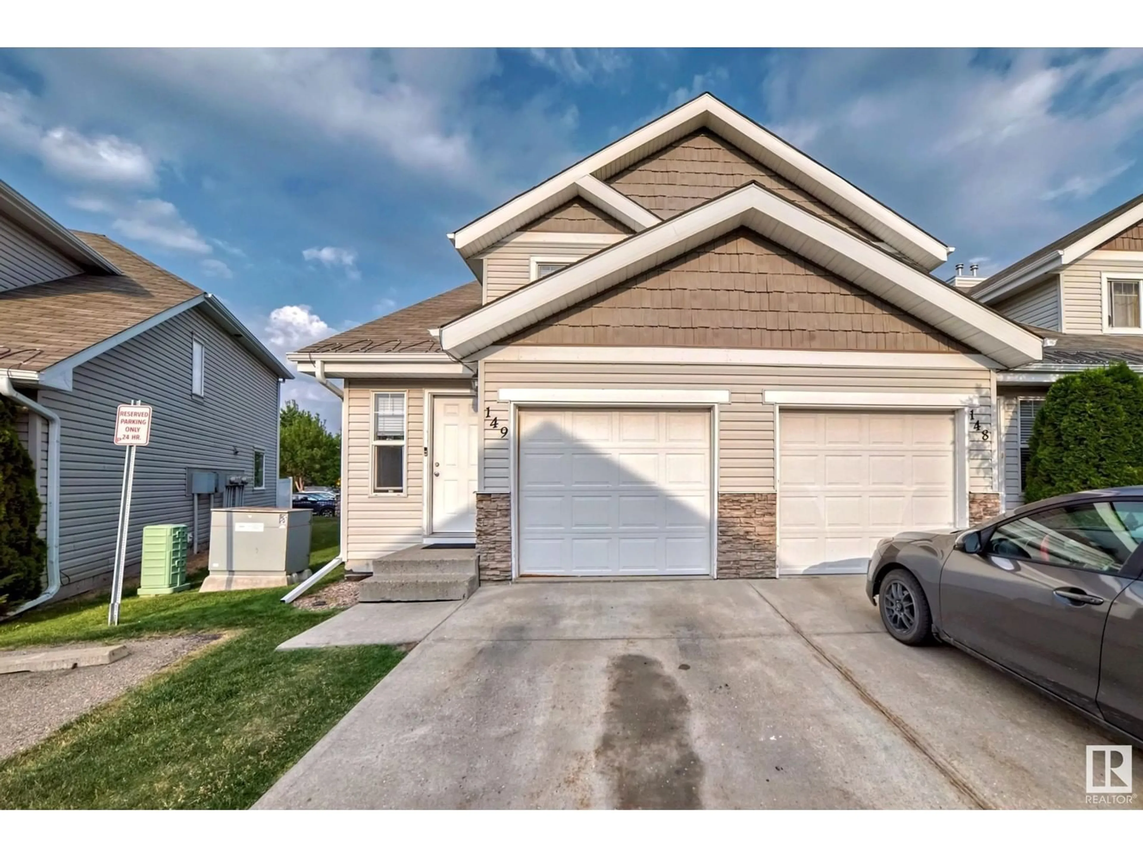 Frontside or backside of a home for #149 150 EDWARDS DR SW, Edmonton Alberta T6X1M4