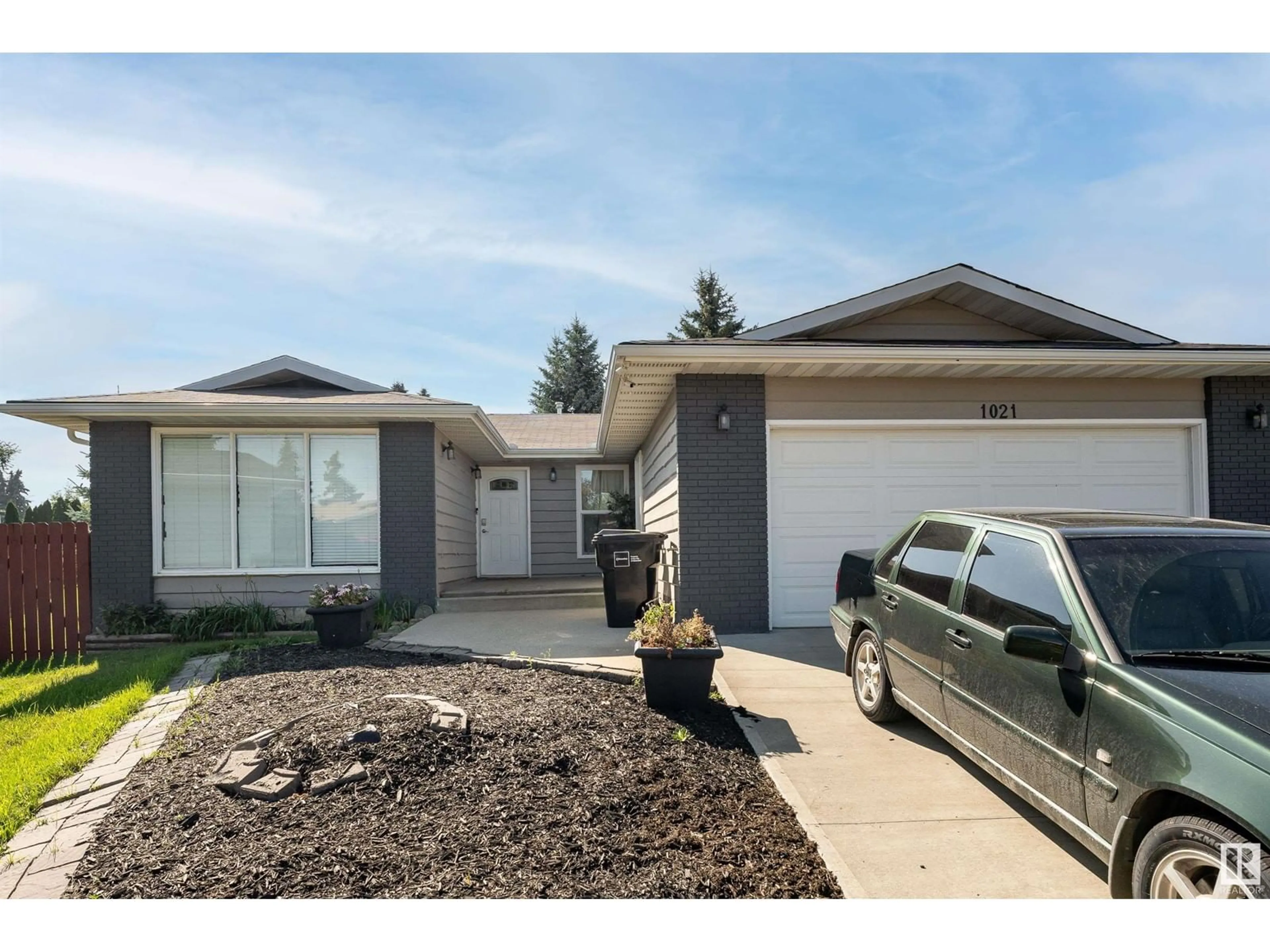 Frontside or backside of a home for 1021 73 ST NW, Edmonton Alberta T6K3K7