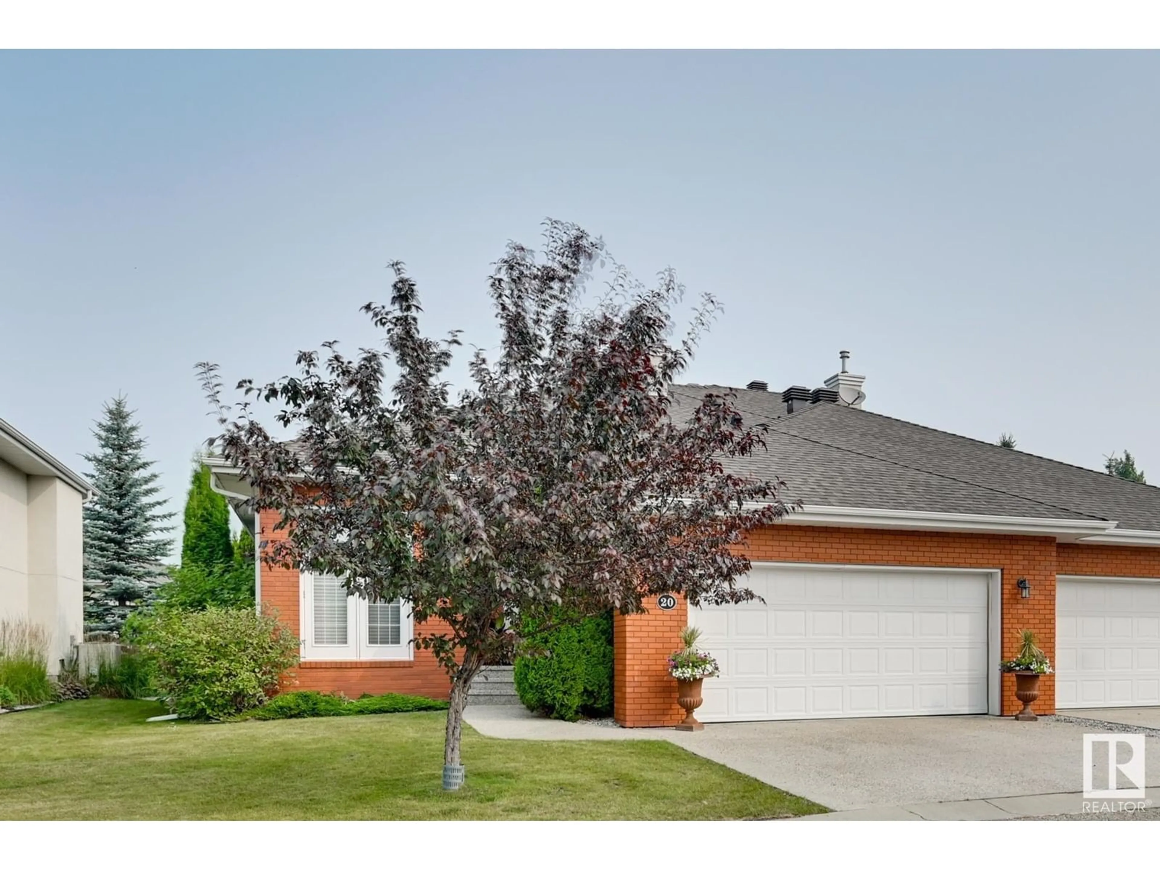 Frontside or backside of a home for #20 1225 WANYANDI RD NW, Edmonton Alberta T6M2W7