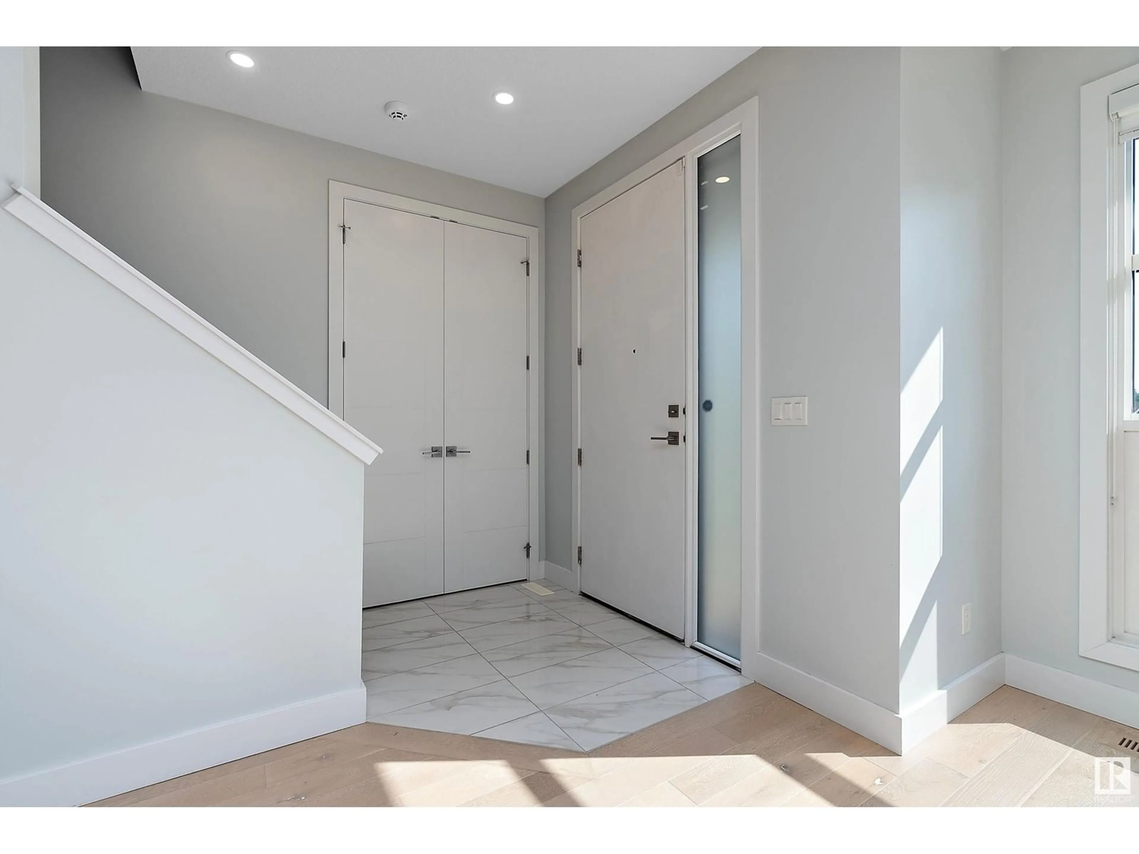 Indoor entryway, wood floors for 9122 142 ST NW NW, Edmonton Alberta T5R0M7