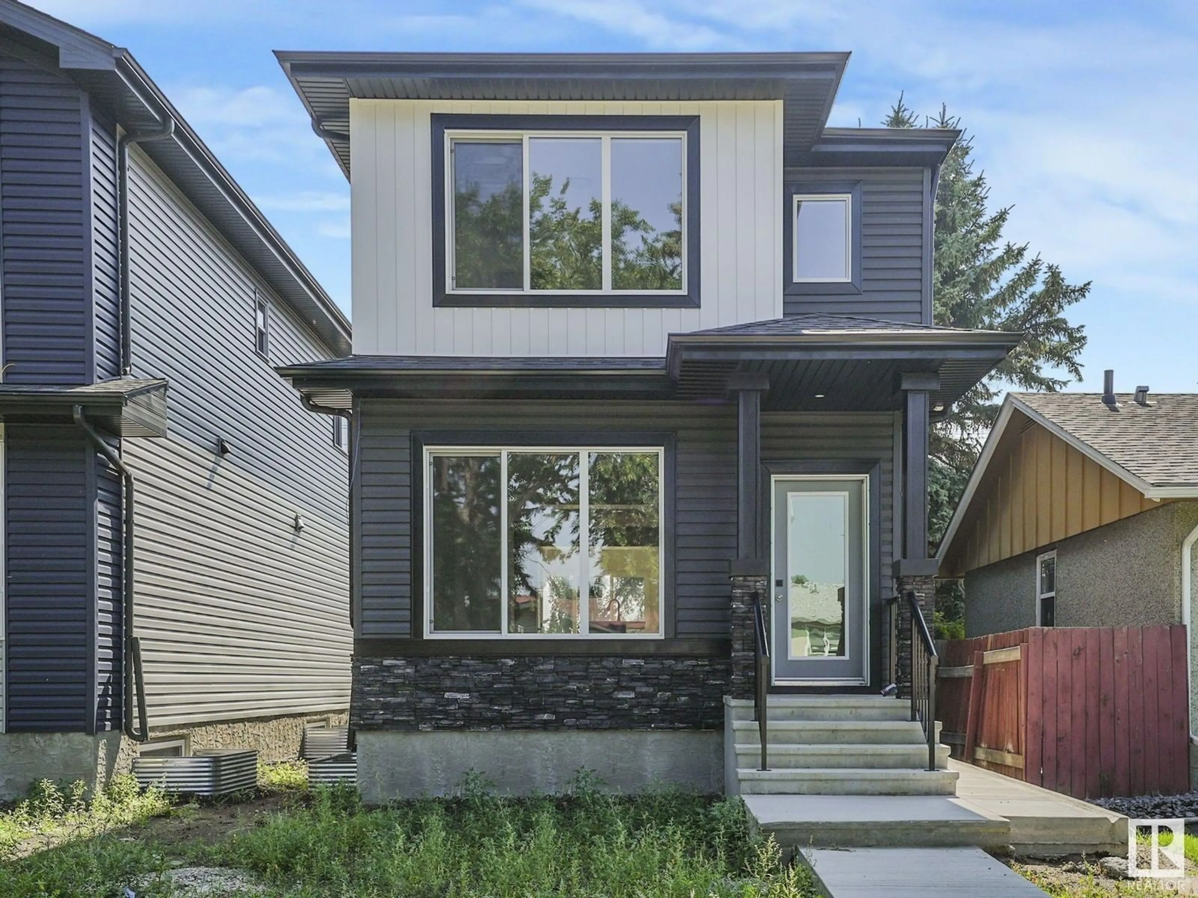 Frontside or backside of a home, the street view for 4639 114 AV NW, Edmonton Alberta T6J0Z9