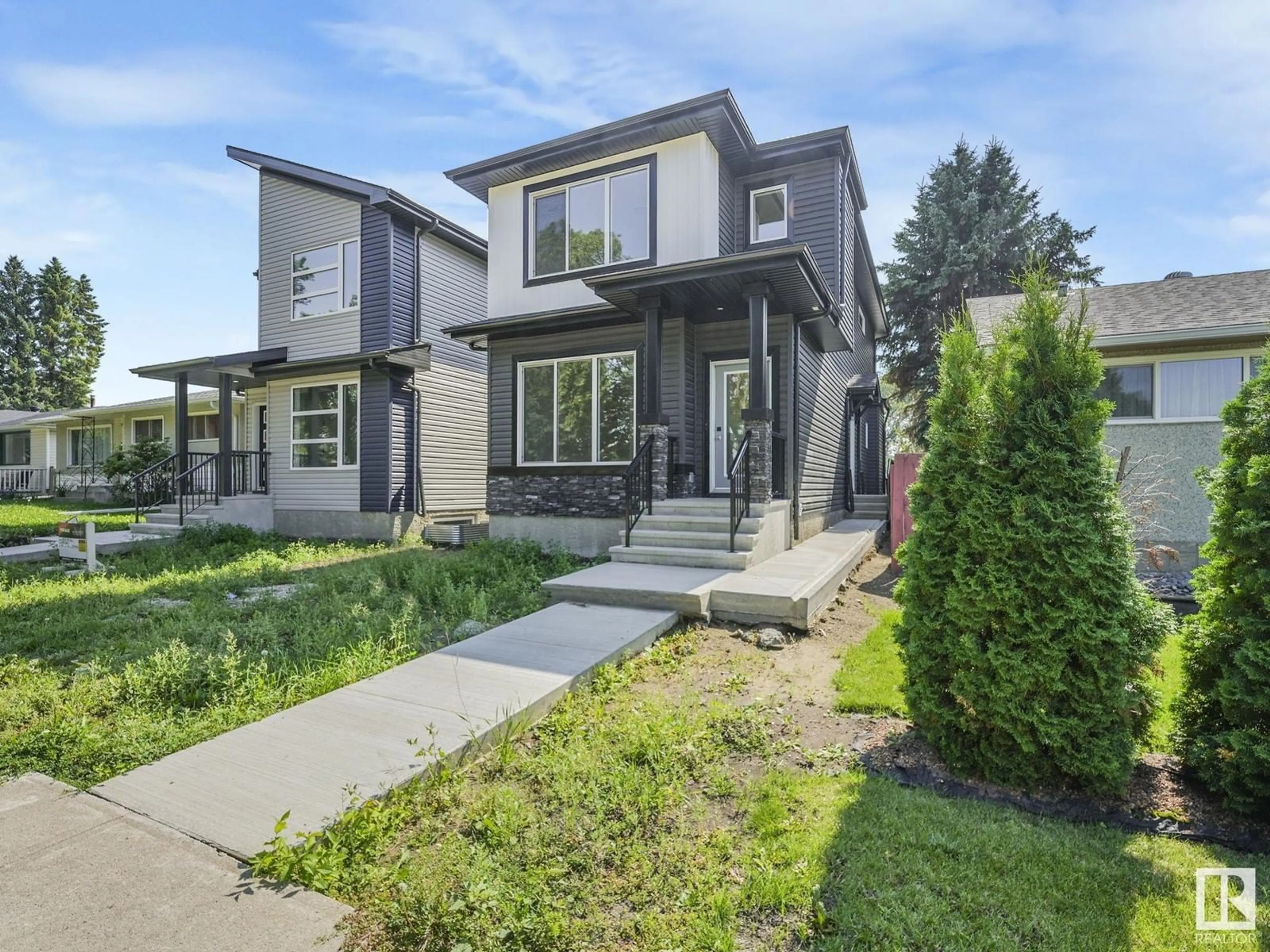 Frontside or backside of a home, the fenced backyard for 4639 114 AV NW, Edmonton Alberta T6J0Z9