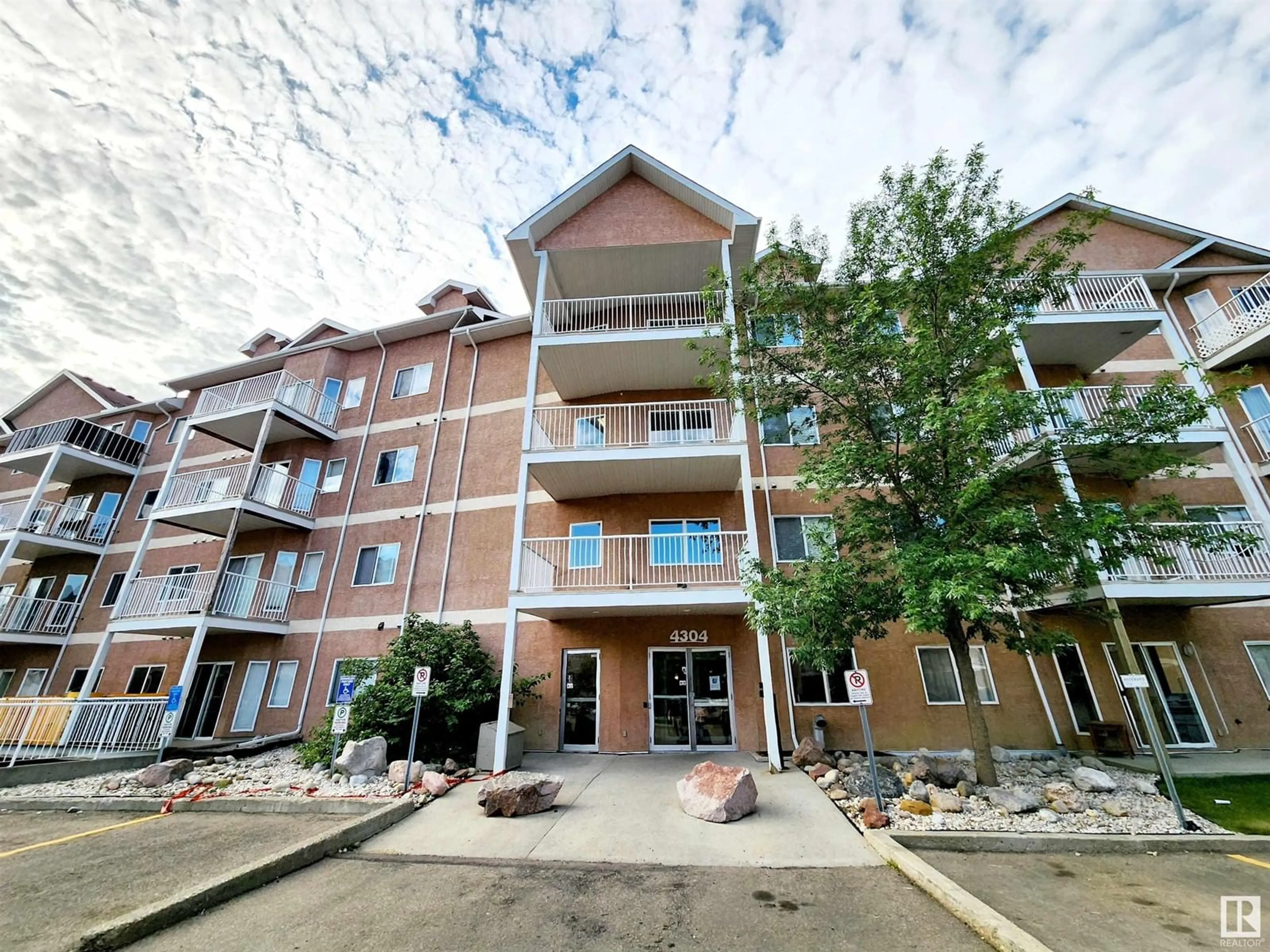 A pic from exterior of the house or condo for #218 4304 139 AV NW, Edmonton Alberta T5Y0H6