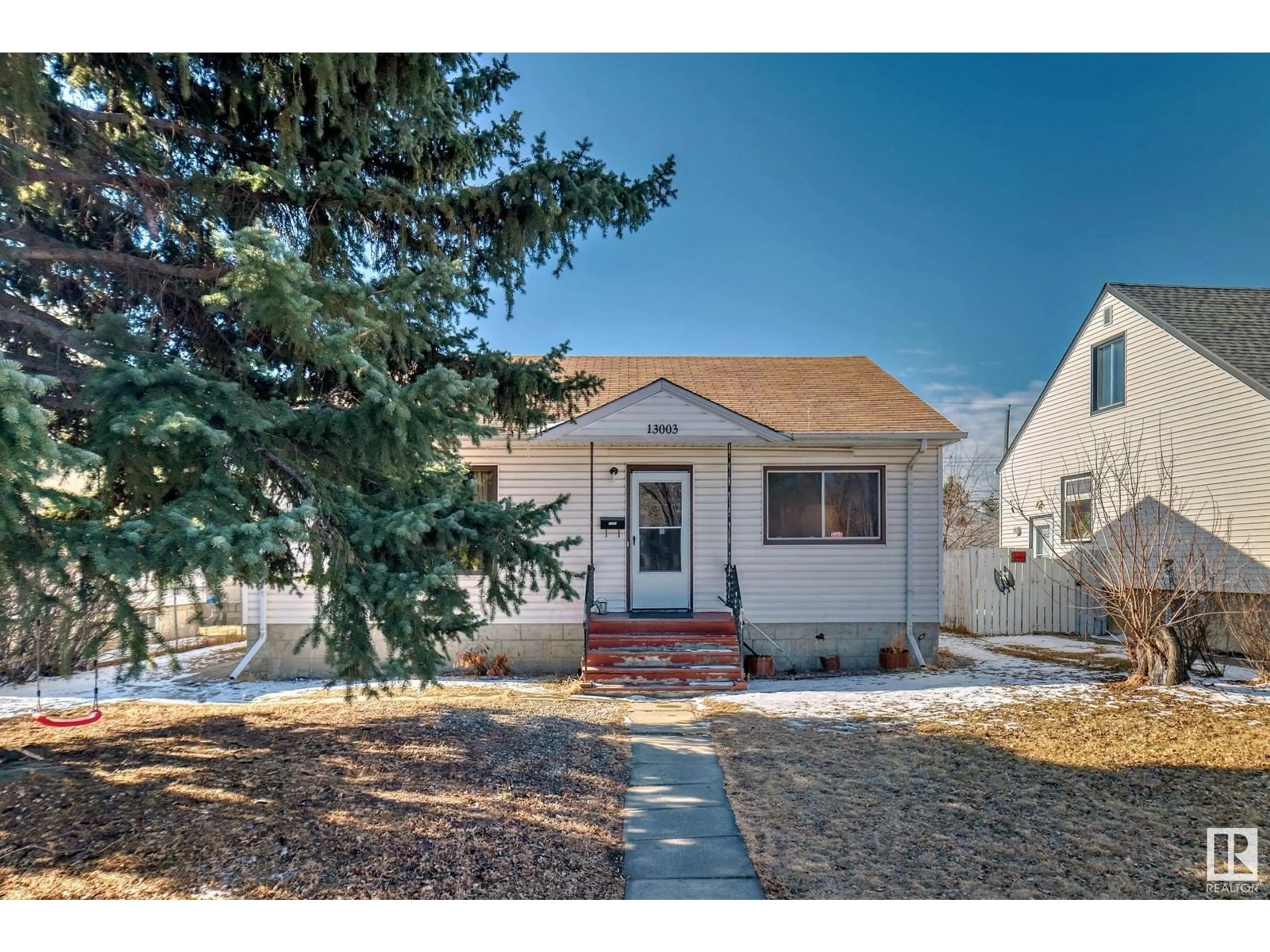 Frontside or backside of a home for 13003 SHERBROOKE AV NW, Edmonton Alberta T5L4E6