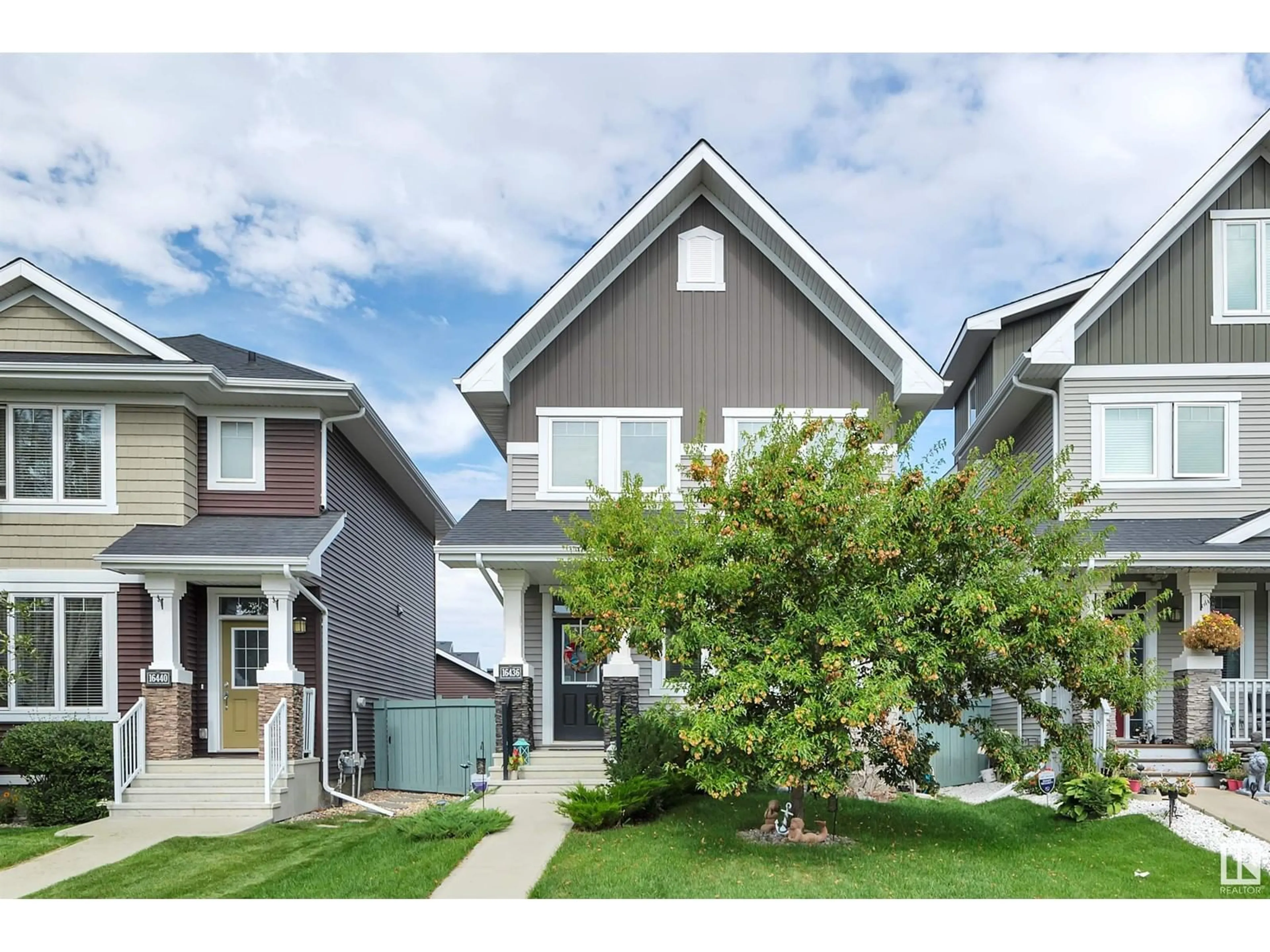 Frontside or backside of a home for 16436 15 AV SW, Edmonton Alberta T6W2T2