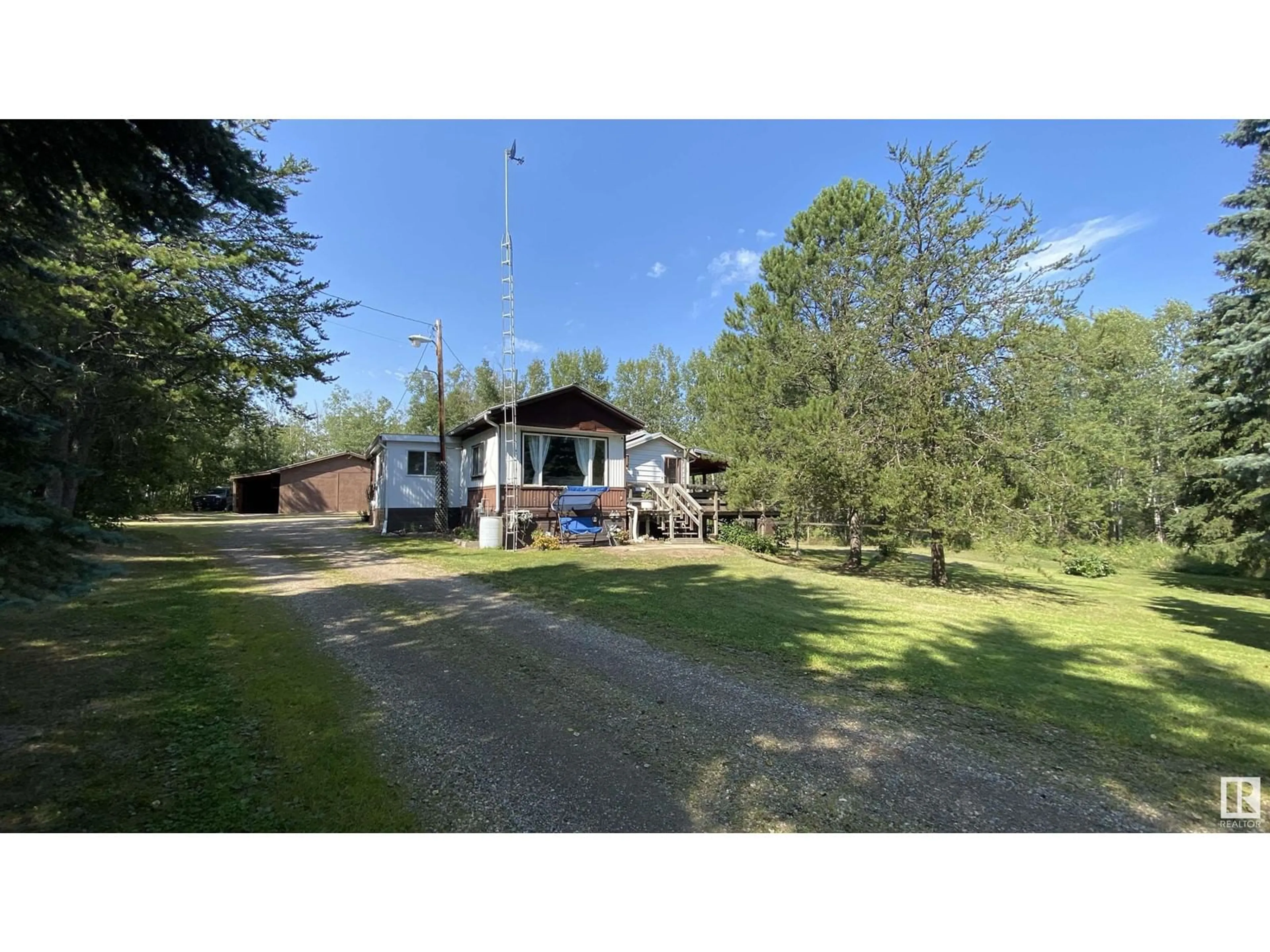 Frontside or backside of a home, cottage for #106 11124 TWP RD 595, Rural St. Paul County Alberta T0A0C0