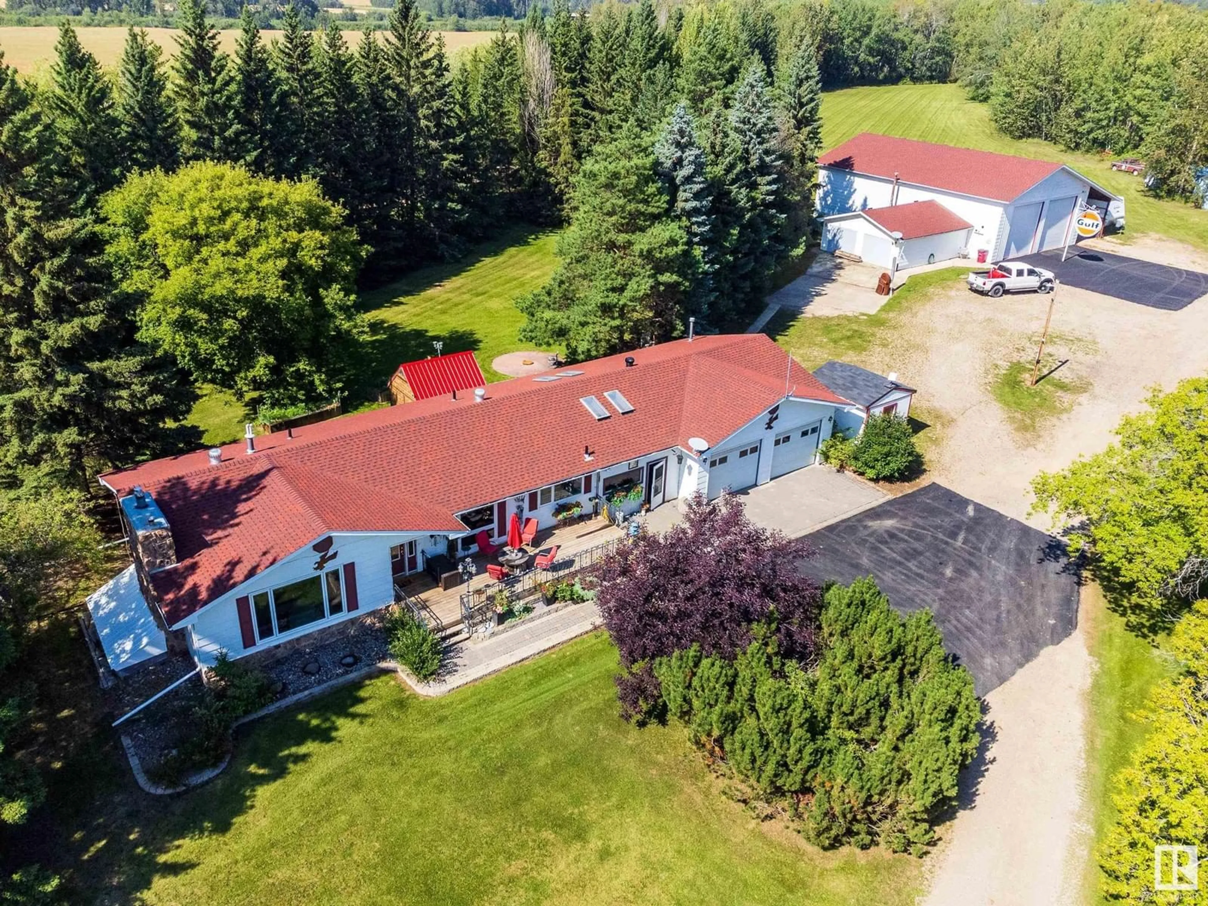 A pic from outside/outdoor area/front of a property/back of a property/a pic from drone, unknown for 27132 Twp Rd 632B, Rural Westlock County Alberta T0G1H0