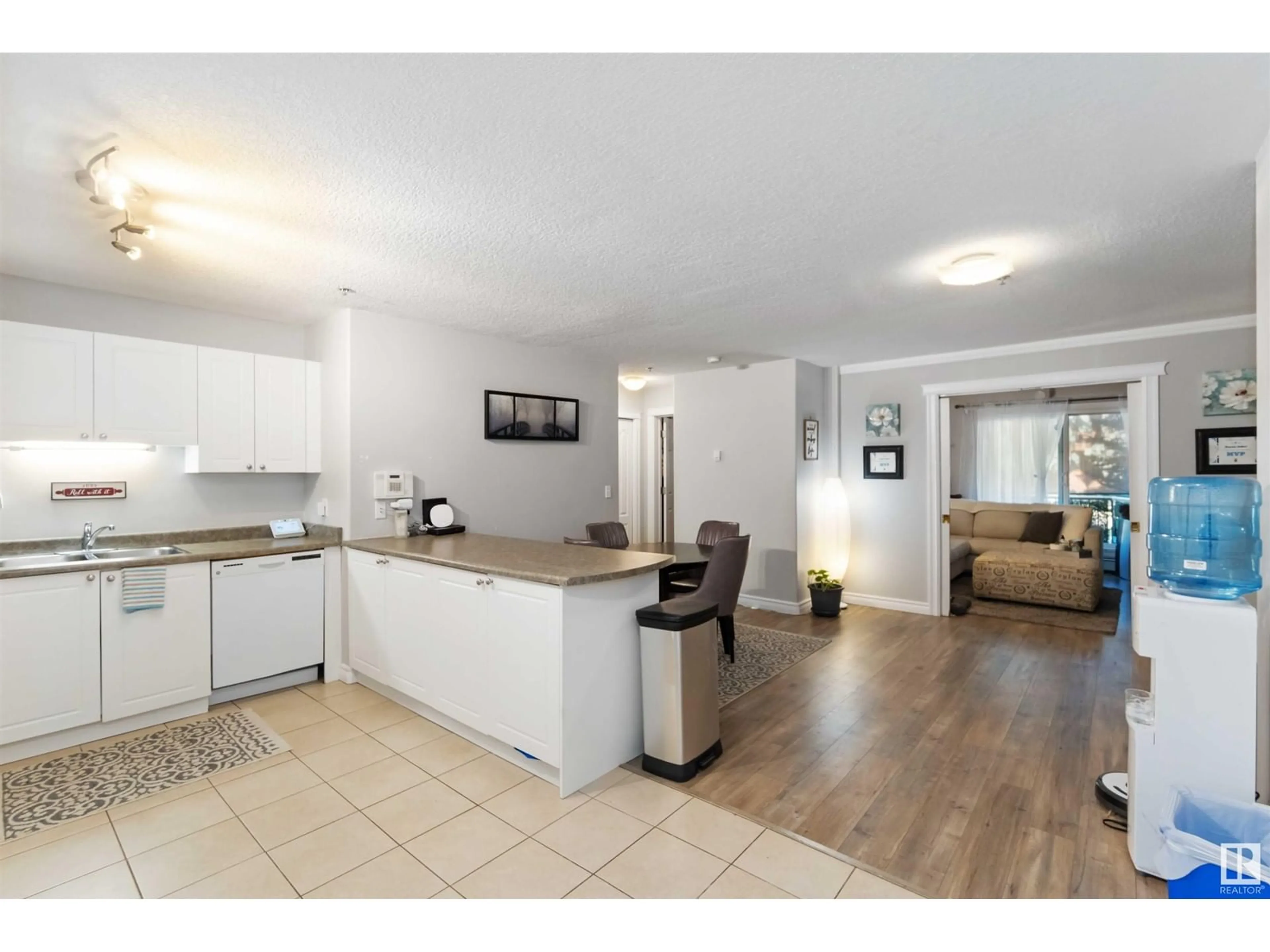 Open concept kitchen for #101 11207 116 ST NW, Edmonton Alberta T5G3K5