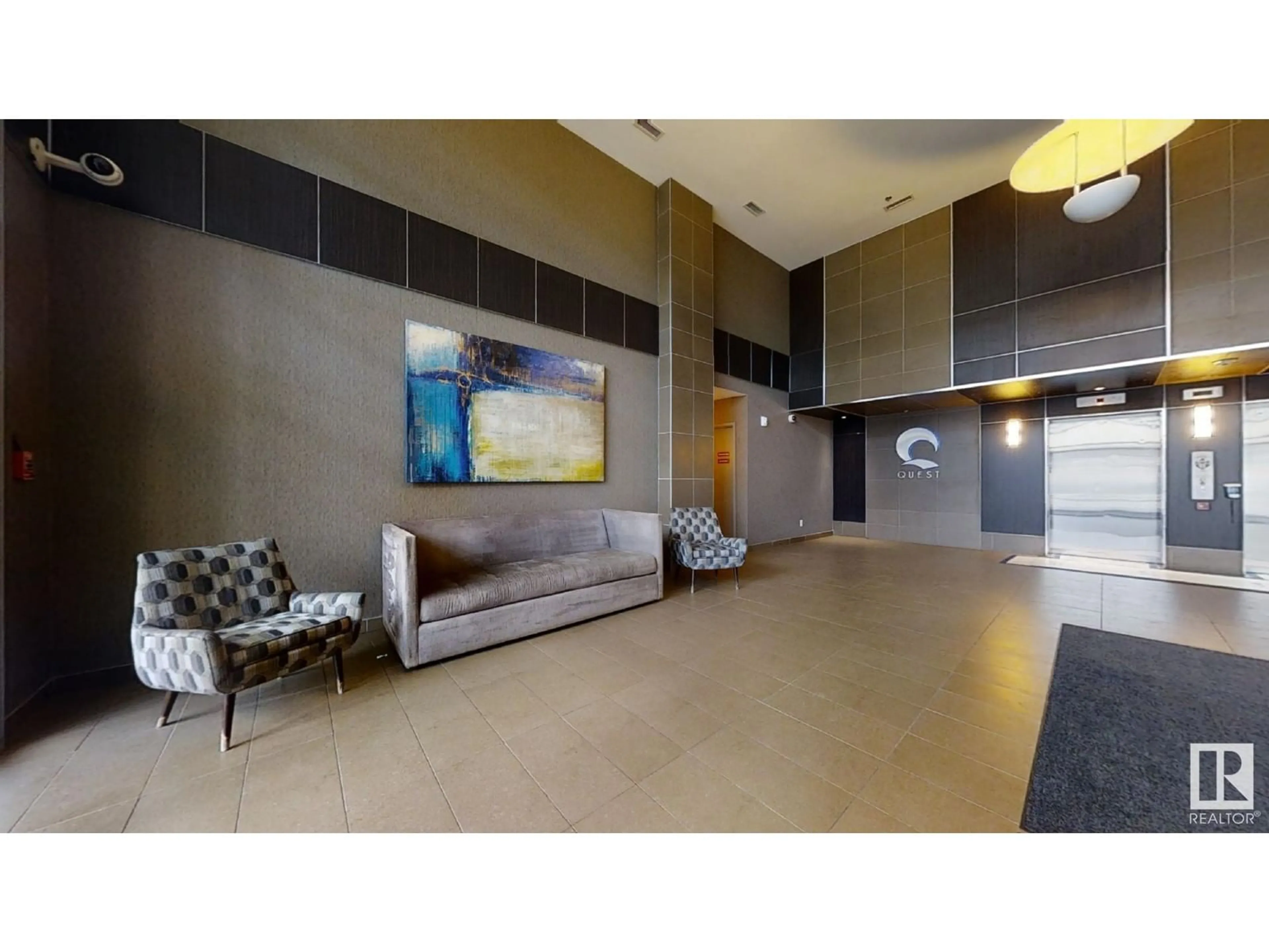 Indoor lobby, cement floor for #1804 10388 105 ST NW, Edmonton Alberta T5J0C2