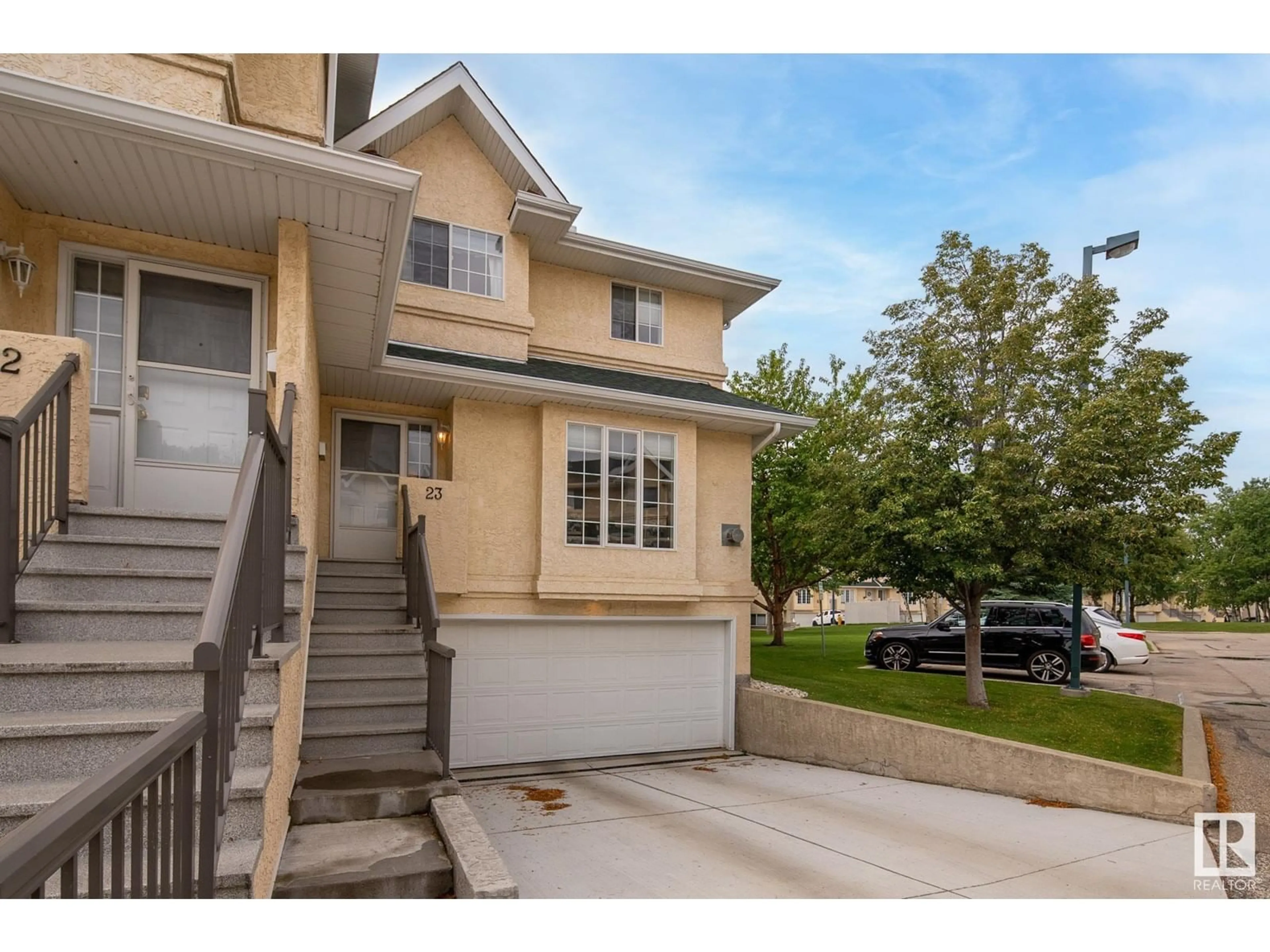 A pic from exterior of the house or condo for #23 2419 133 AV NW, Edmonton Alberta T5A5A5