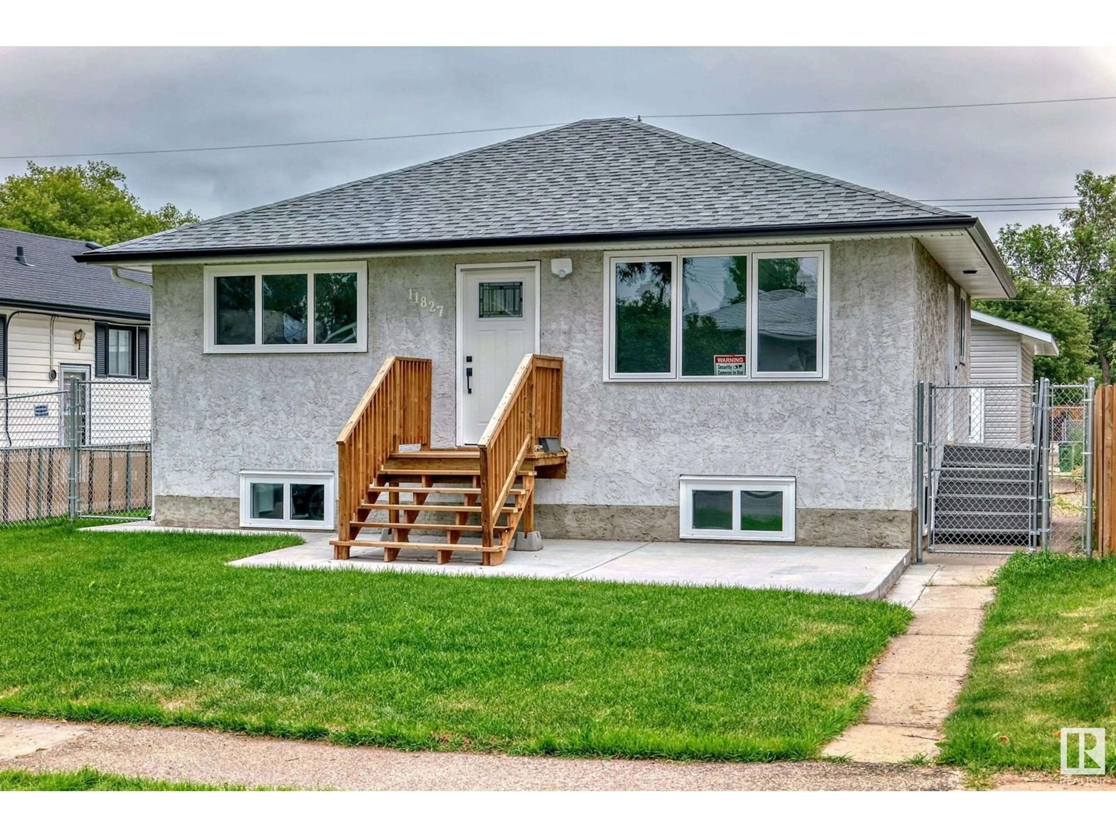 Frontside or backside of a home for 11827 43 ST NW NW, Edmonton Alberta T5W2P3