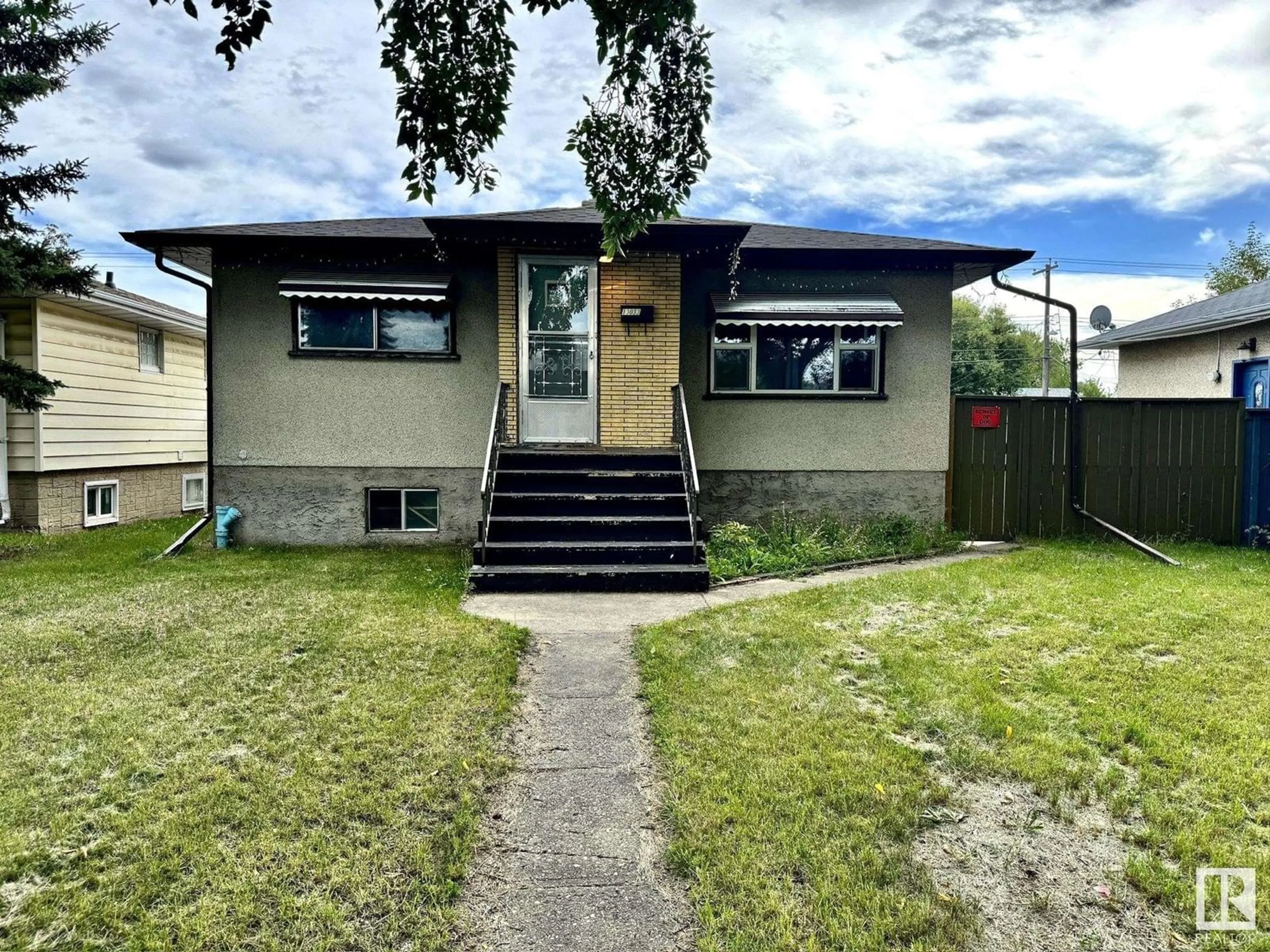 Frontside or backside of a home for 13033 64 ST NW, Edmonton Alberta T5A0Y3