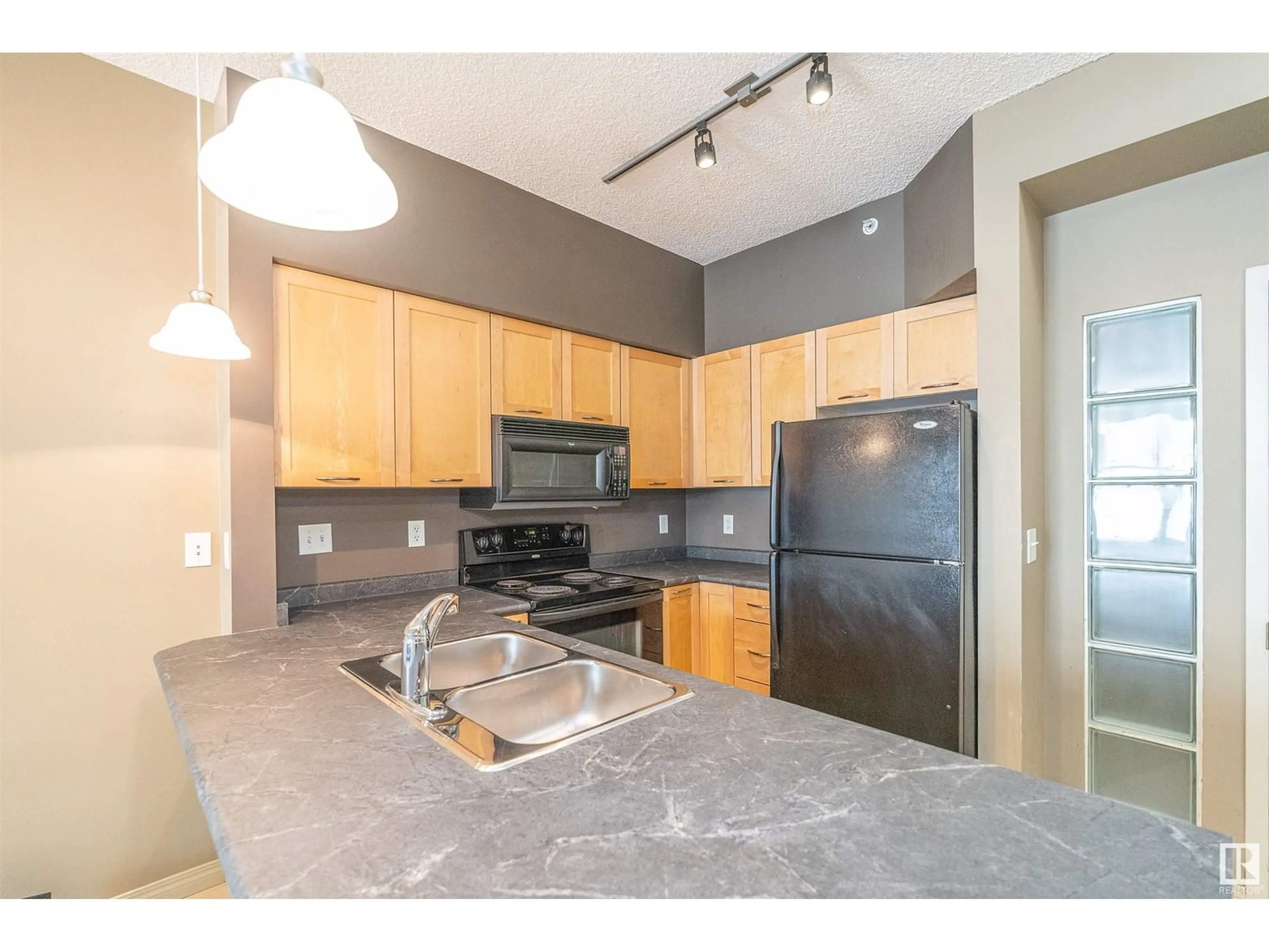 Standard kitchen for #2-310 4245 139 AV NW, Edmonton Alberta T5Y3E8