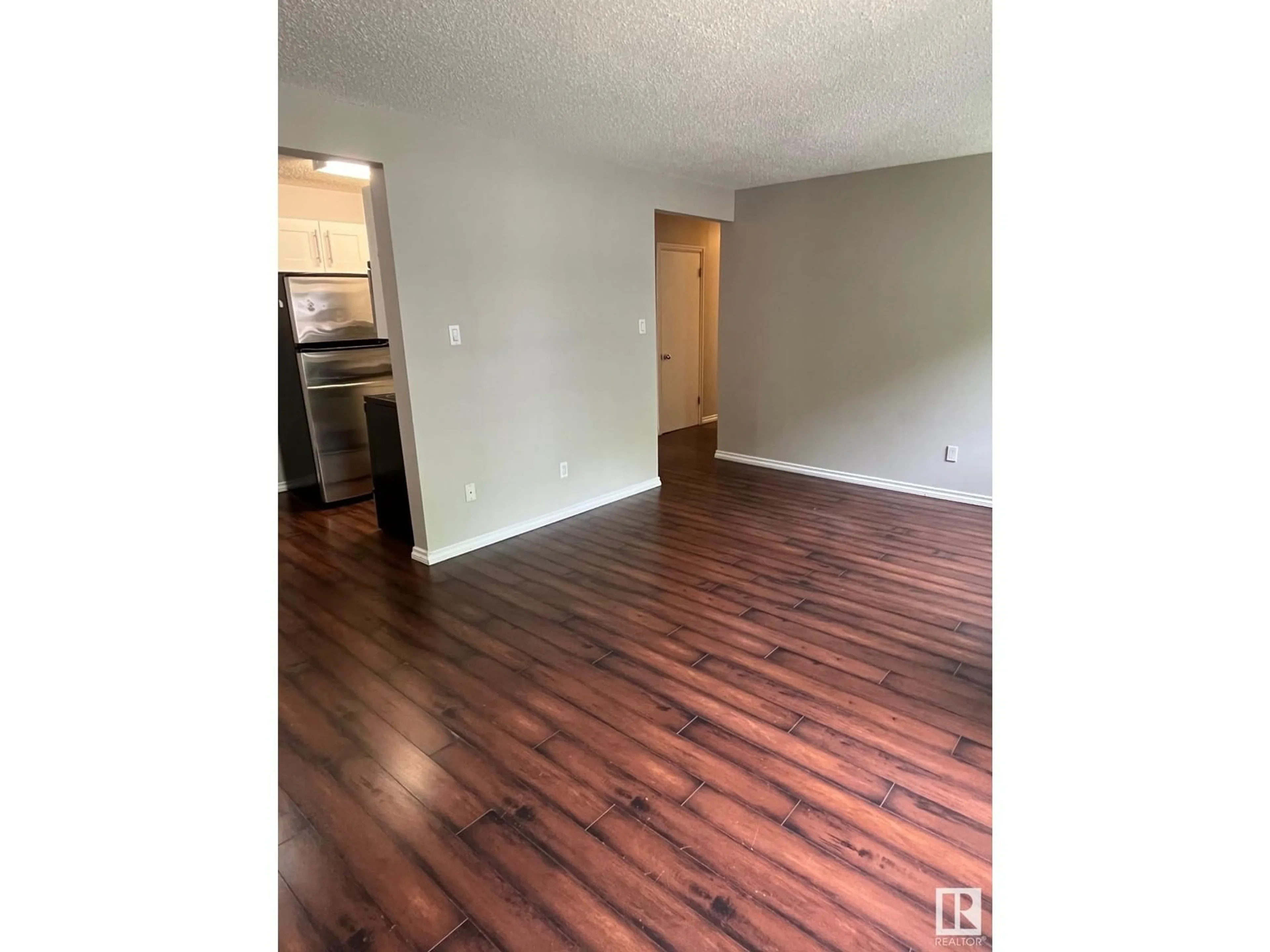 A pic of a room, wood floors for #207 10305 116 street NW NW, Edmonton Alberta T5K1W5