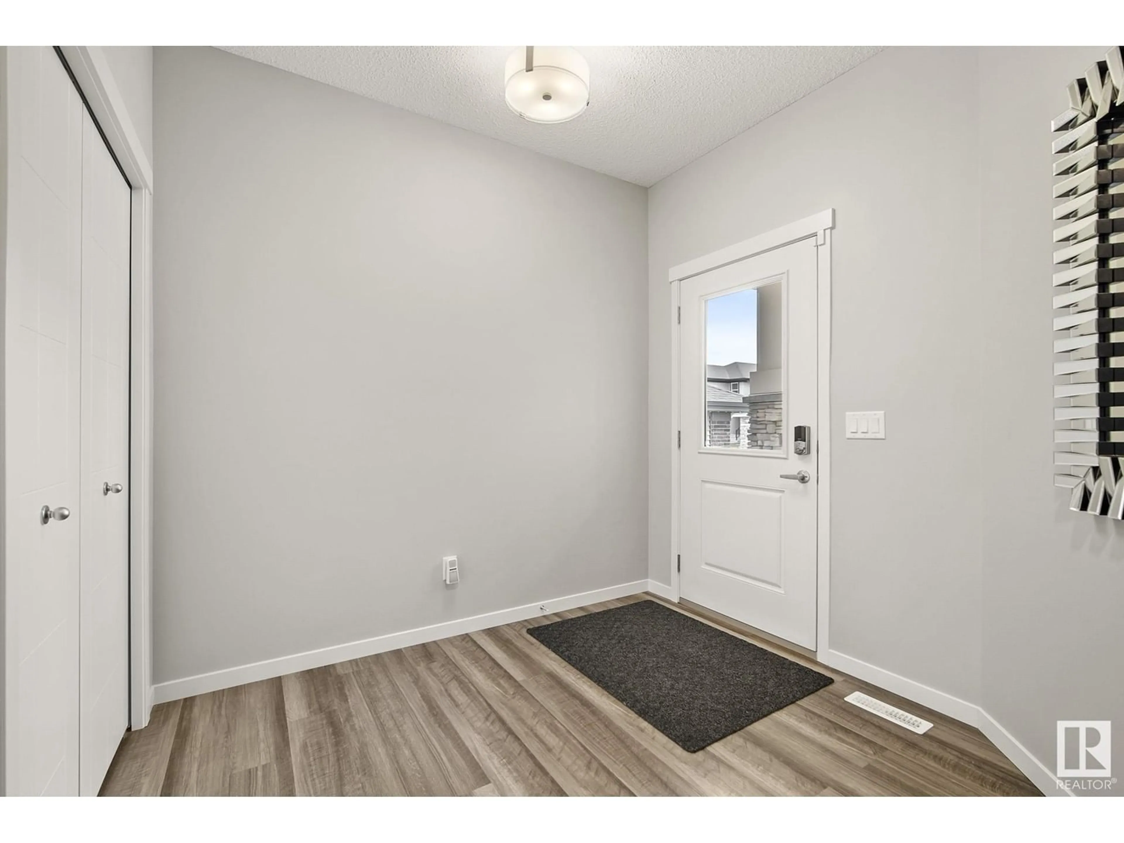 Indoor entryway, wood floors for 717 KINGLET BV NW, Edmonton Alberta T5S0N8