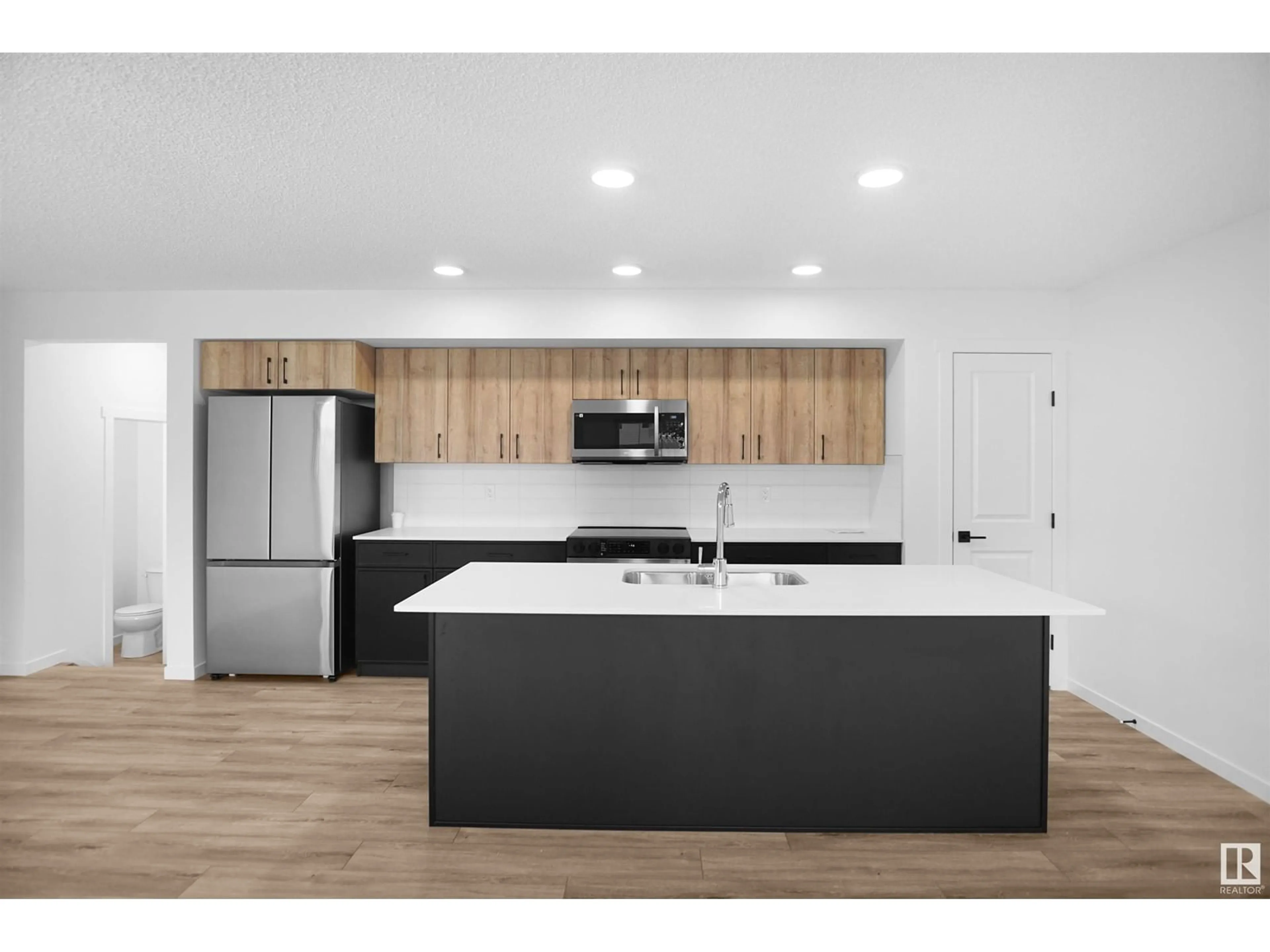 Open concept kitchen for #29 905 172 ST SW, Edmonton Alberta T6W3V5