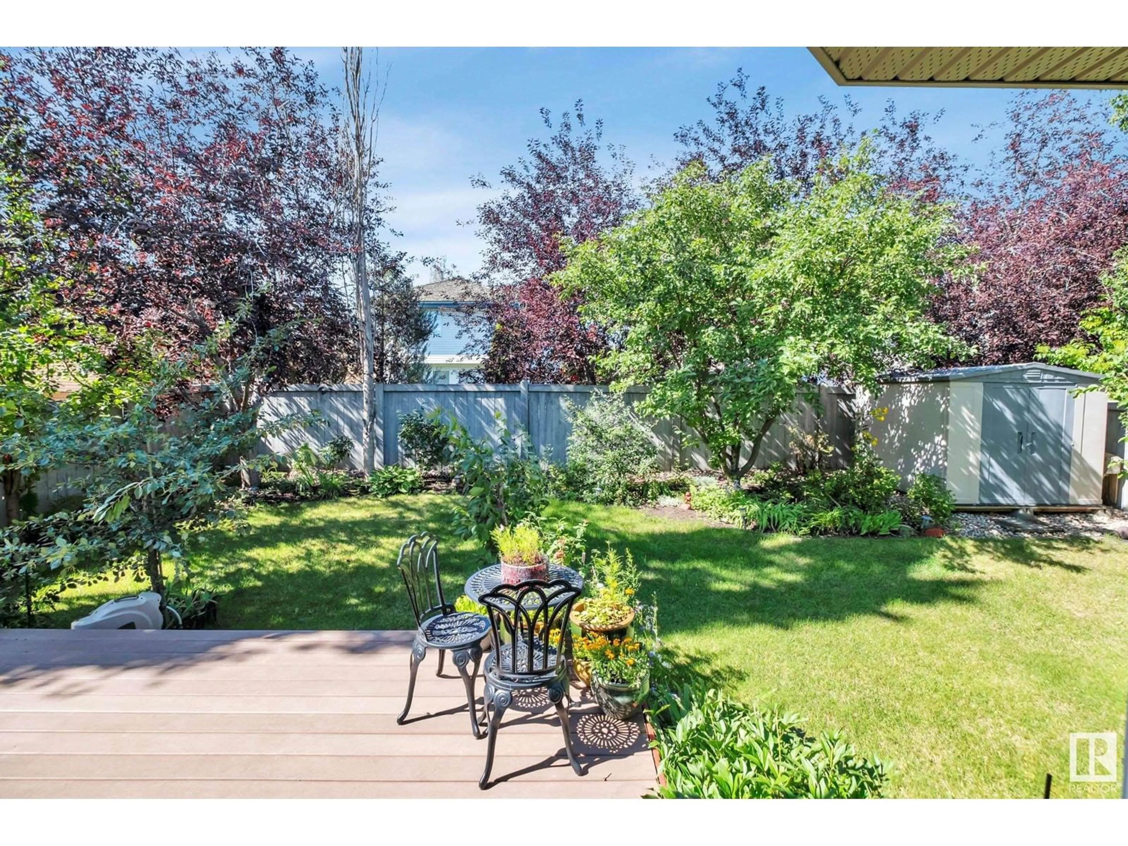 Patio, the fenced backyard for 1010 DOWNEY WY NW, Edmonton Alberta T6M2V4